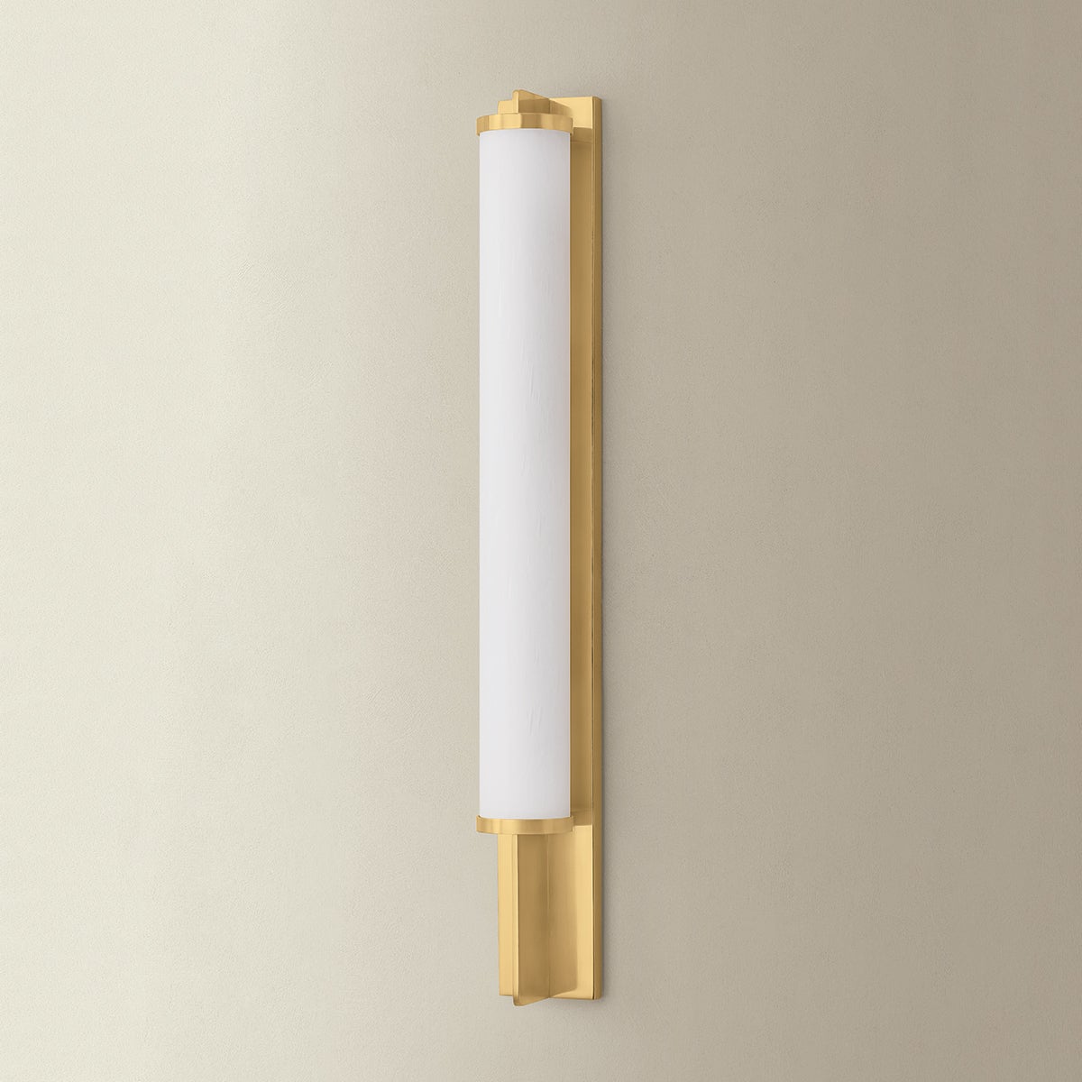 Northfield Wall Sconce 2.75" in aged brass shown from a second angle to highlight the arm curve and shade silhouette.