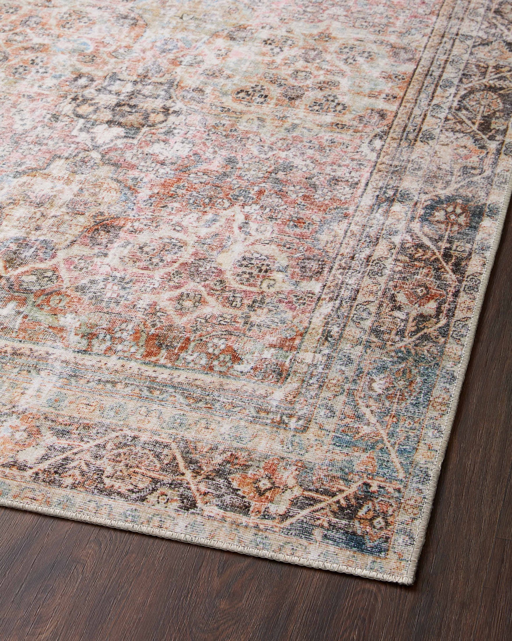 lifestyle view of Adrian Sunset / Charcoal luxury Rug