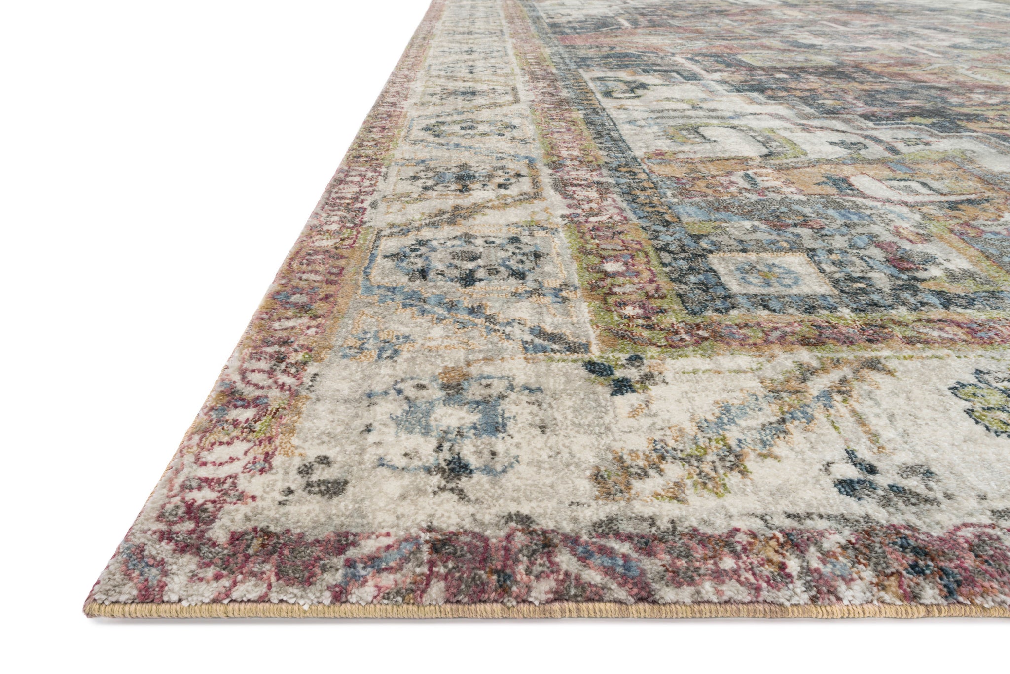 side view of Anastasia Ivory / Multi luxury Rug