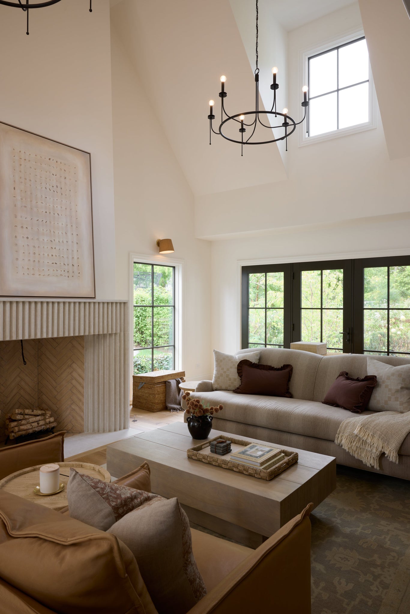 Calder Chandelier styled in a two-story entry for warm, layered light at Laurie Yapp Home.
