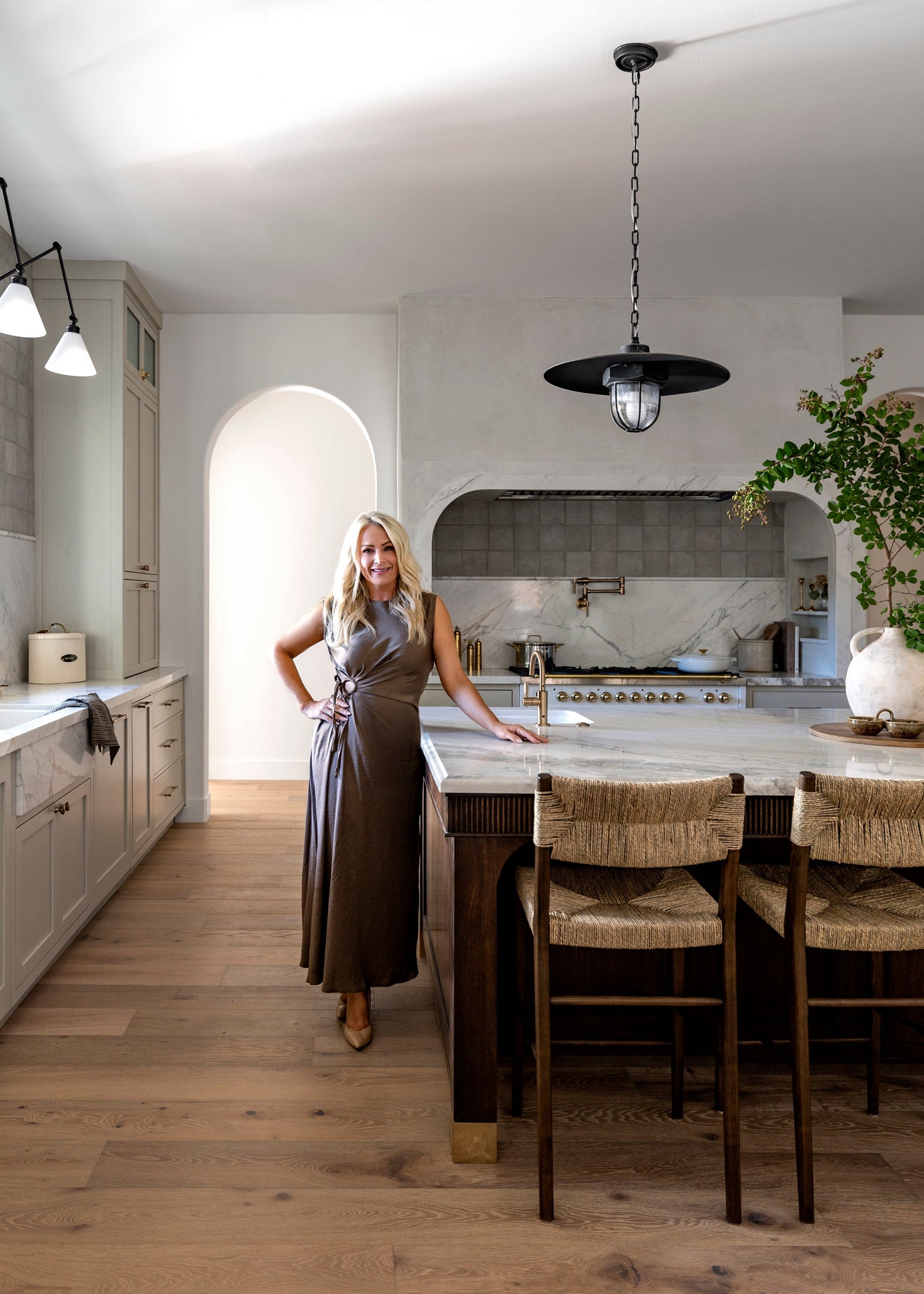 Acme Pendant 22" styled in a bright kitchen for warm, layered light at Laurie Yapp Home.