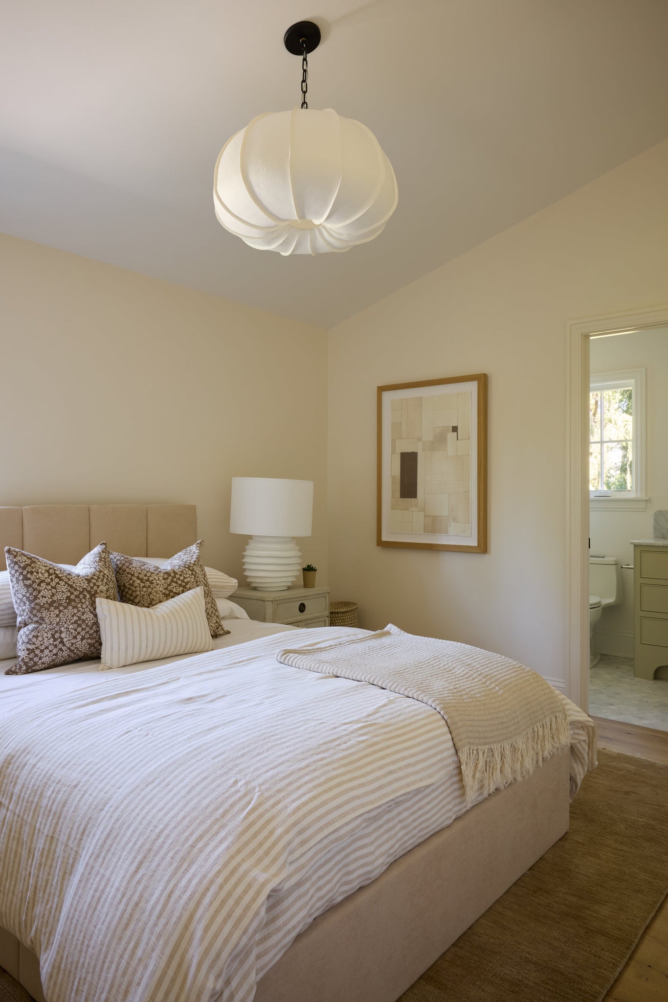 Bayu Pendant 26" styled in a bright kitchen for warm, layered light at Laurie Yapp Home.
