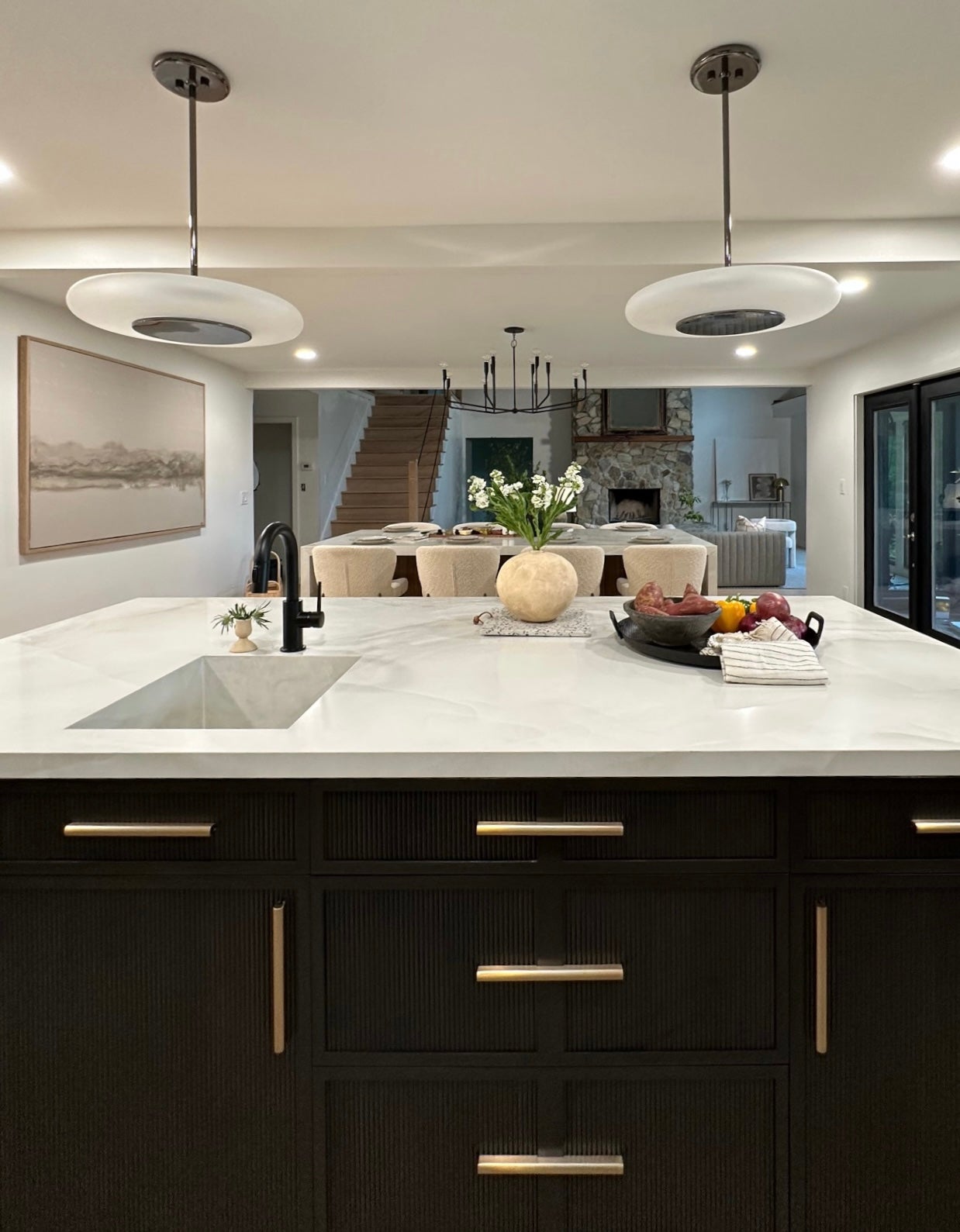 Norman Chandelier 42" styled in a formal living room for warm, layered light at Laurie Yapp Home.