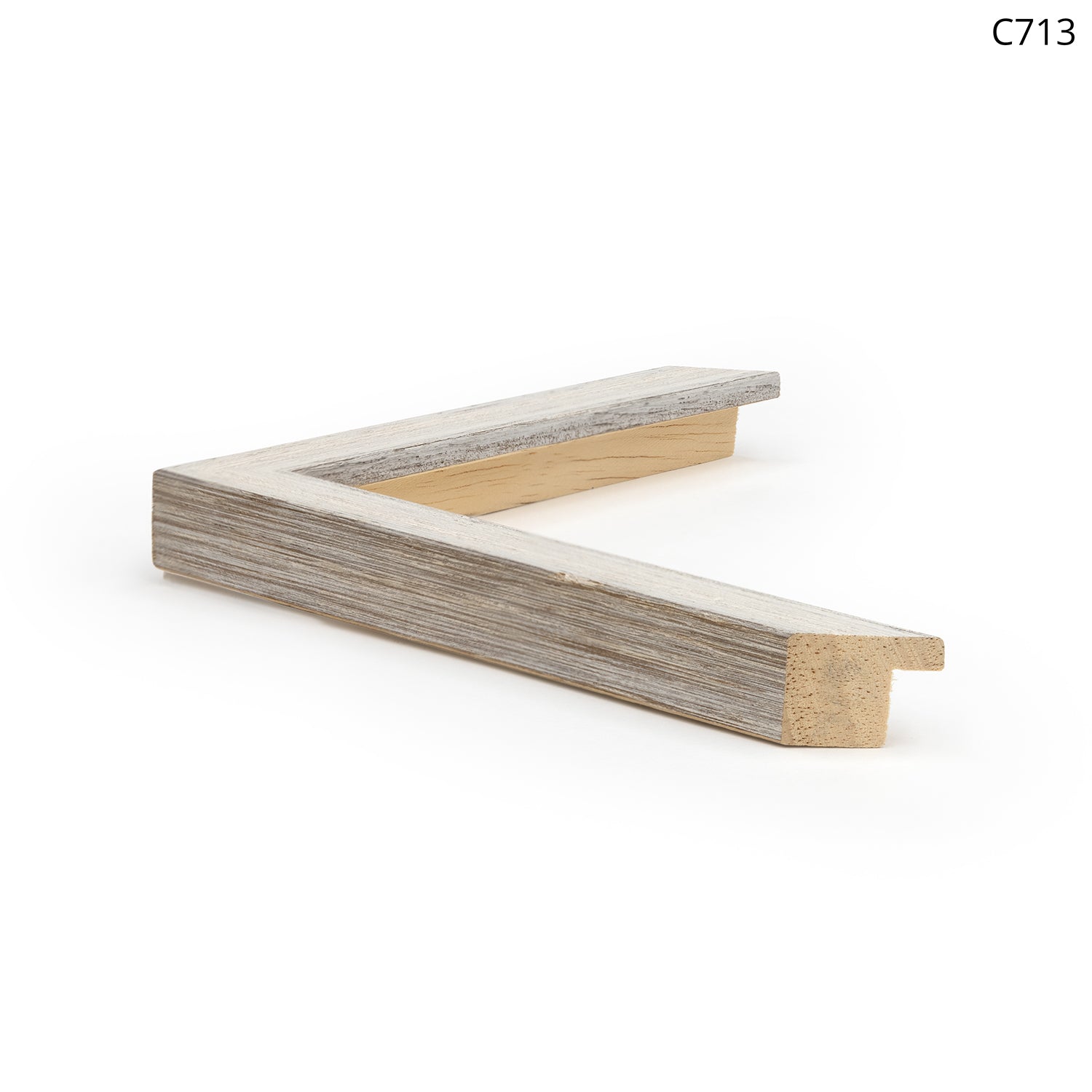 Wooden picture frame with a weathered gray finish, angled view showing the inner edge.