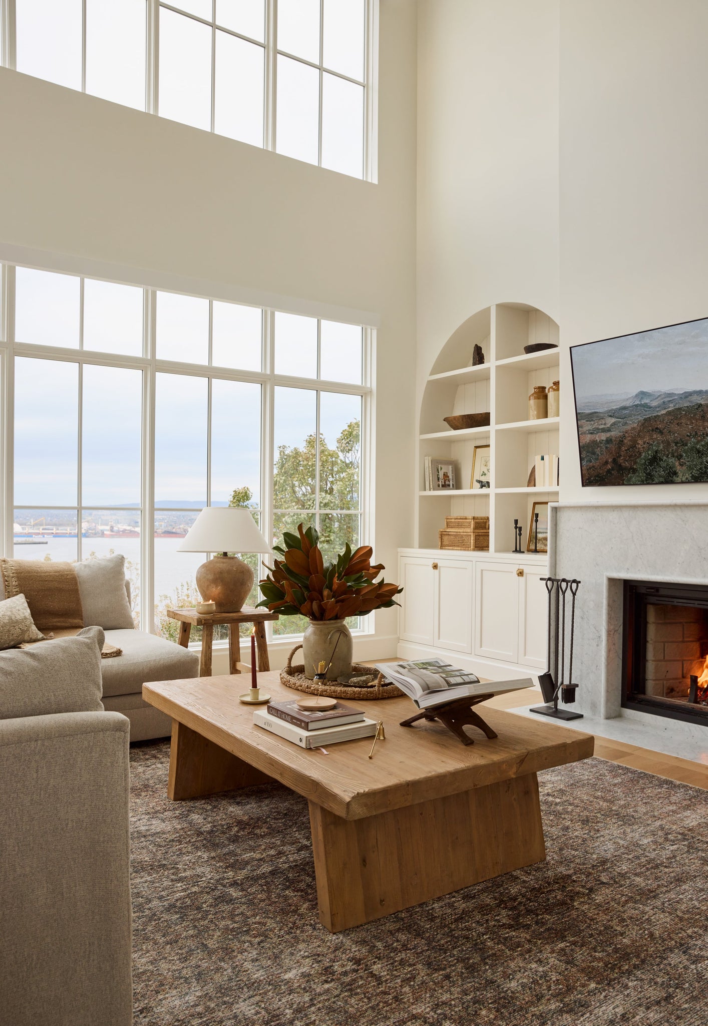 Calabria Table Lamp 22" styled in a curated console for warm, layered light at Laurie Yapp Home.