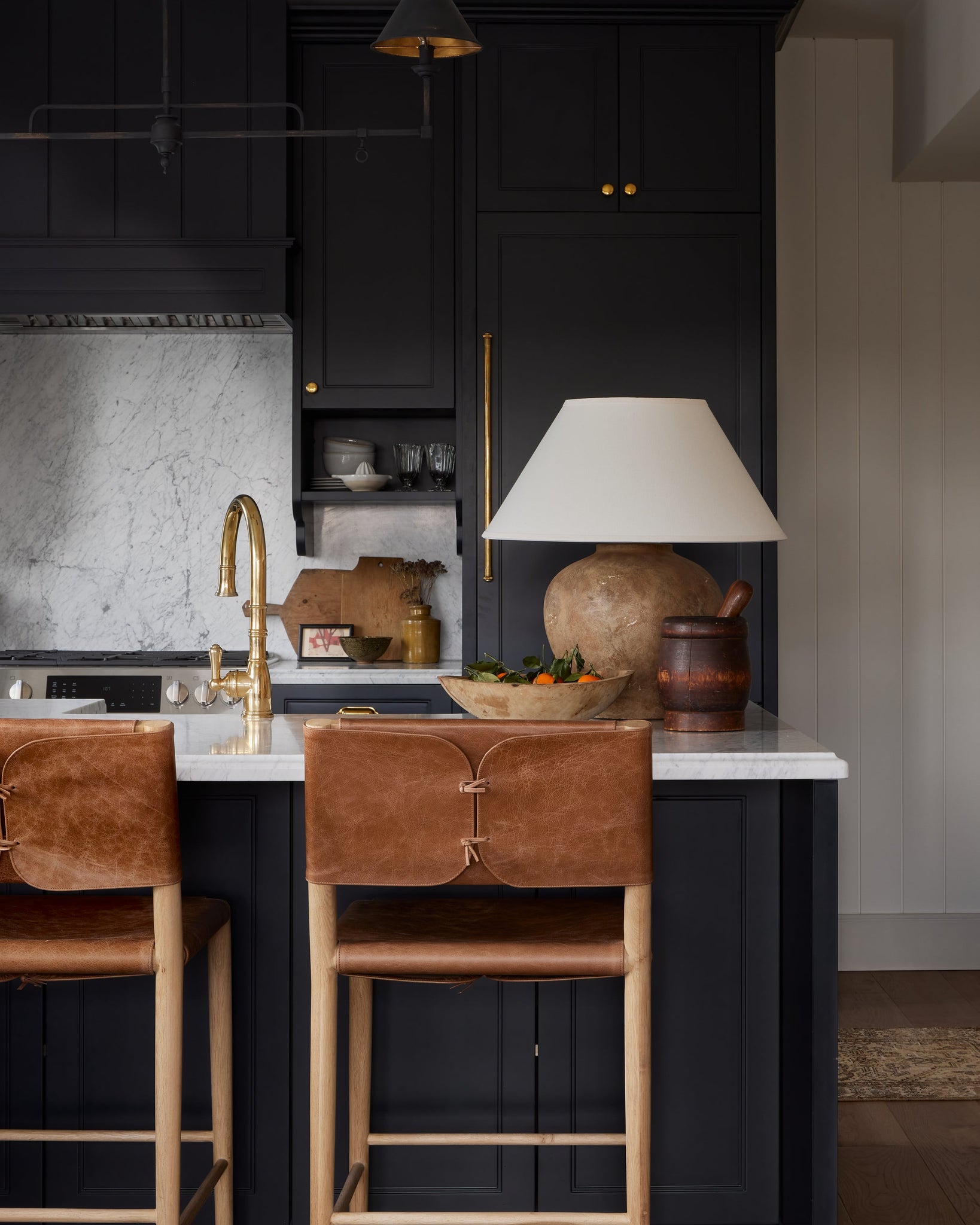 Calabria Table Lamp 22" styled in a living room side table for warm, layered light at Laurie Yapp Home.