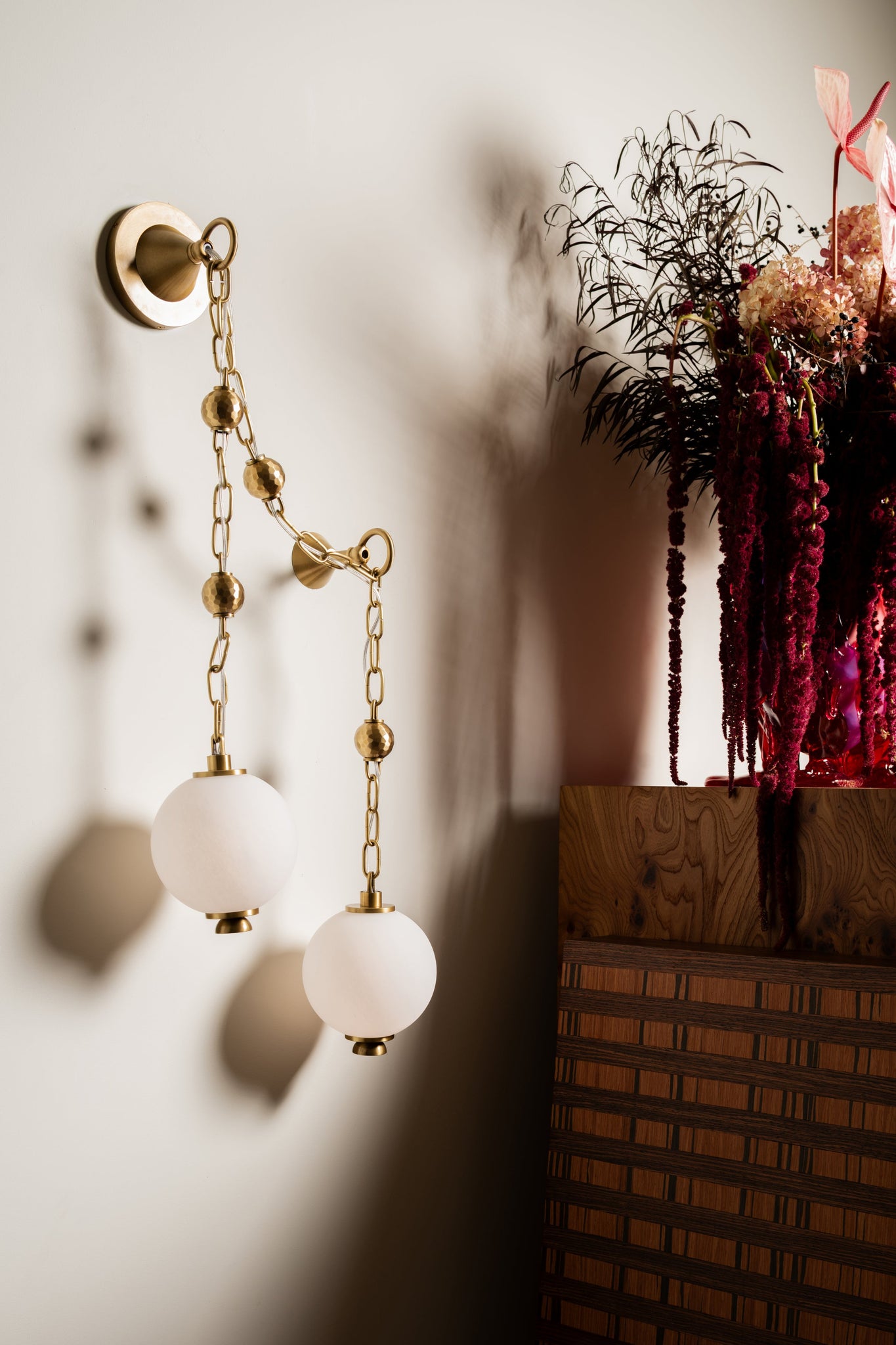 Corda Wall Sconce styled in a curated living room for warm, layered light at Laurie Yapp Home.