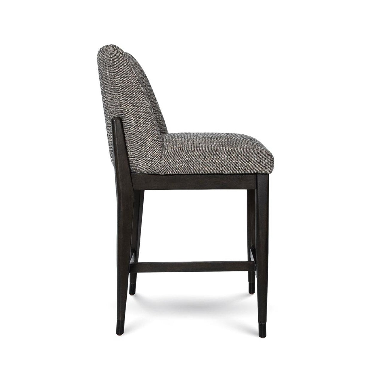 Gray upholstered bar stool with black legs on a white background