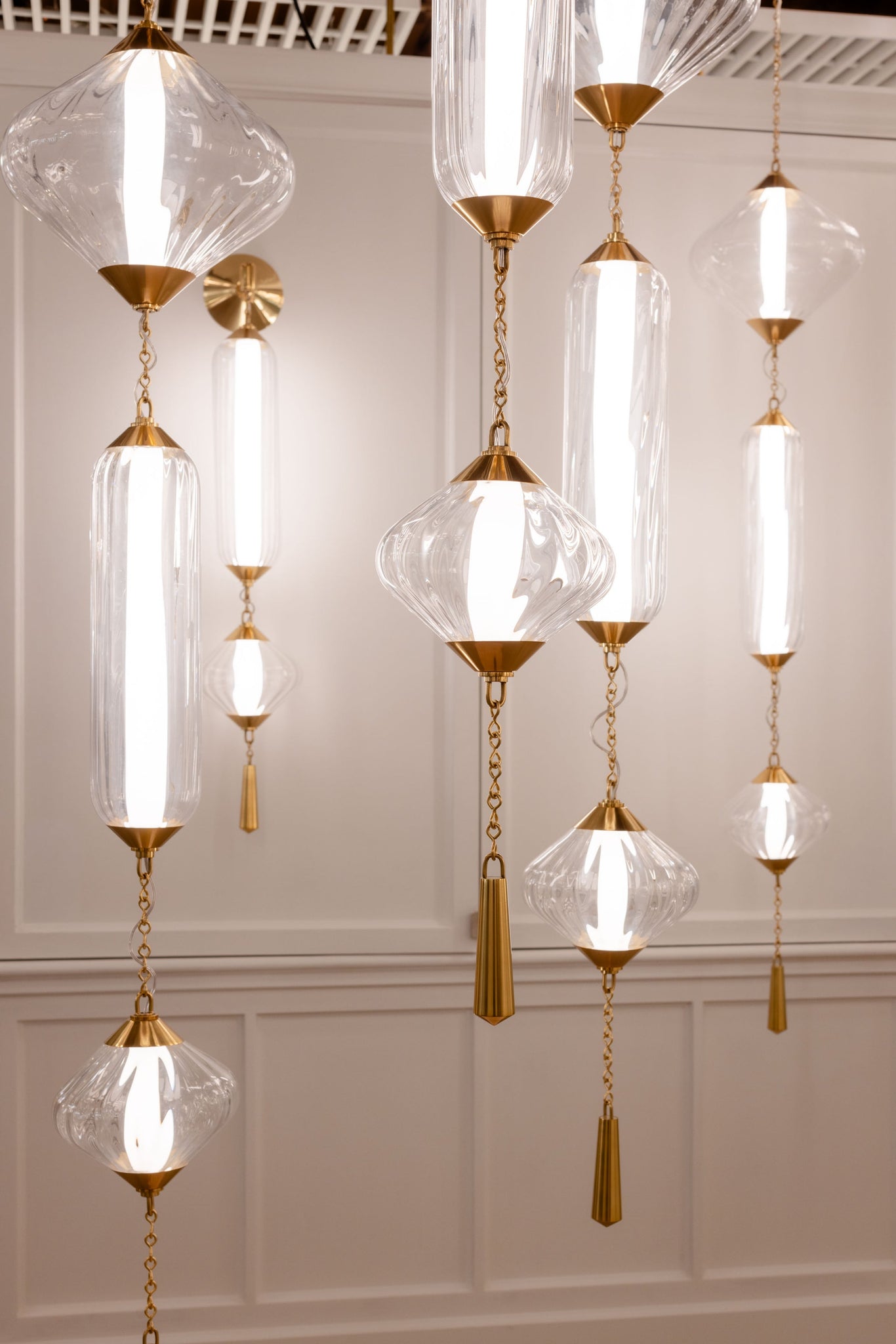 Fiorello Chandelier styled in a formal living room for warm, layered light at Laurie Yapp Home.