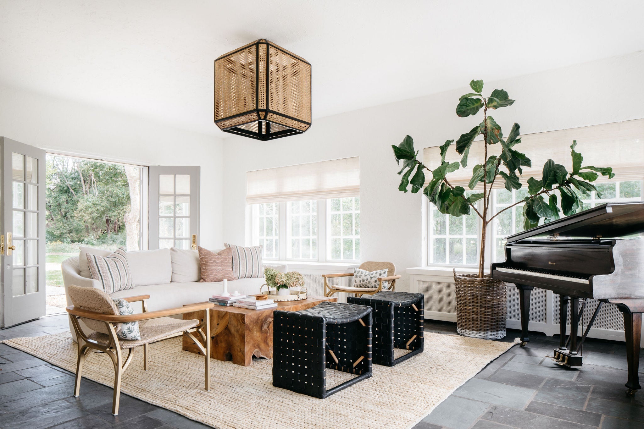 Georgia Chandelier in bronze styled in a two-story entry for warm, layered light at Laurie Yapp Home.