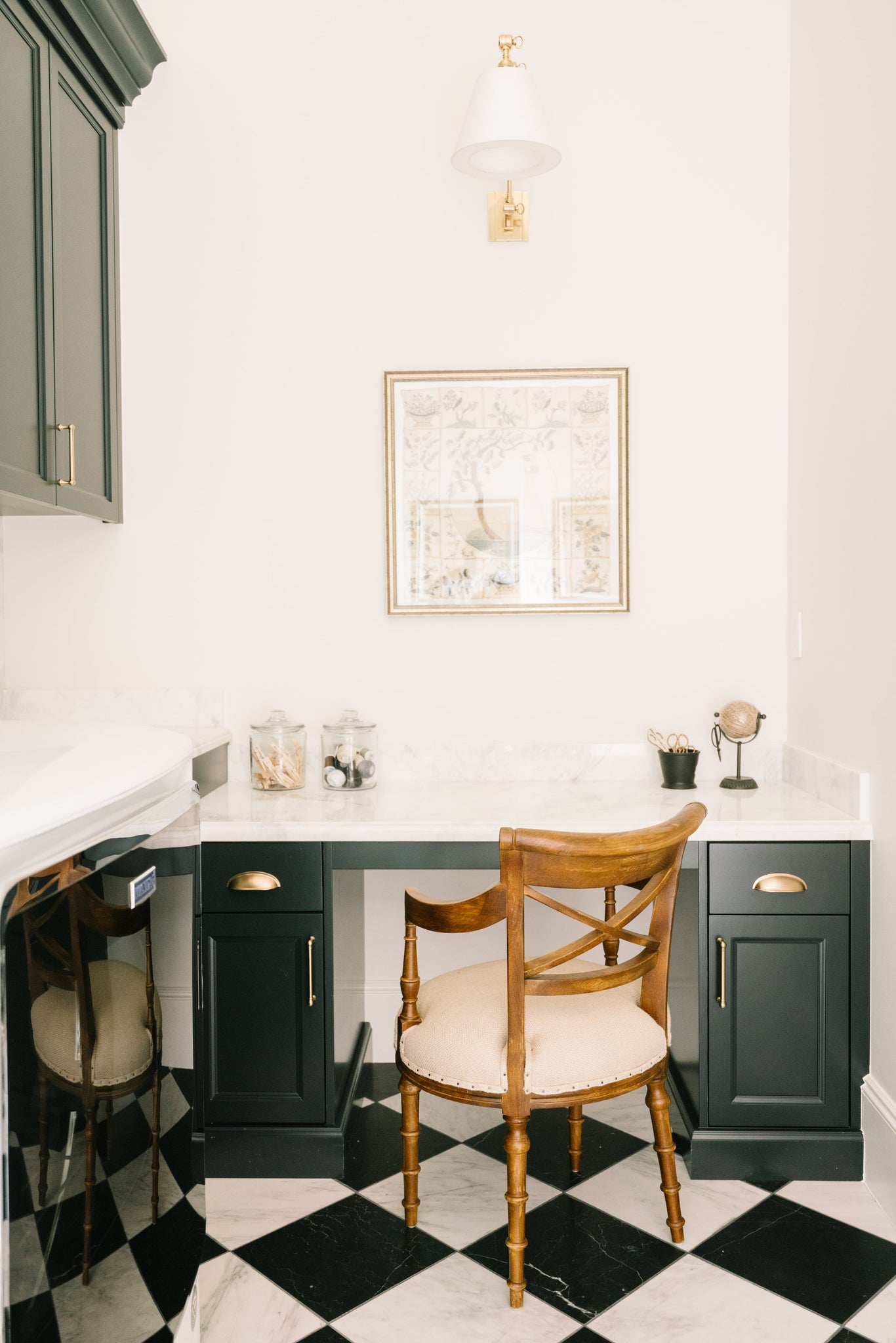 Hillsdale Wall Sconce 10" x 12.75" in aged brass styled in a modern bathroom for warm, layered light at Laurie Yapp Home.