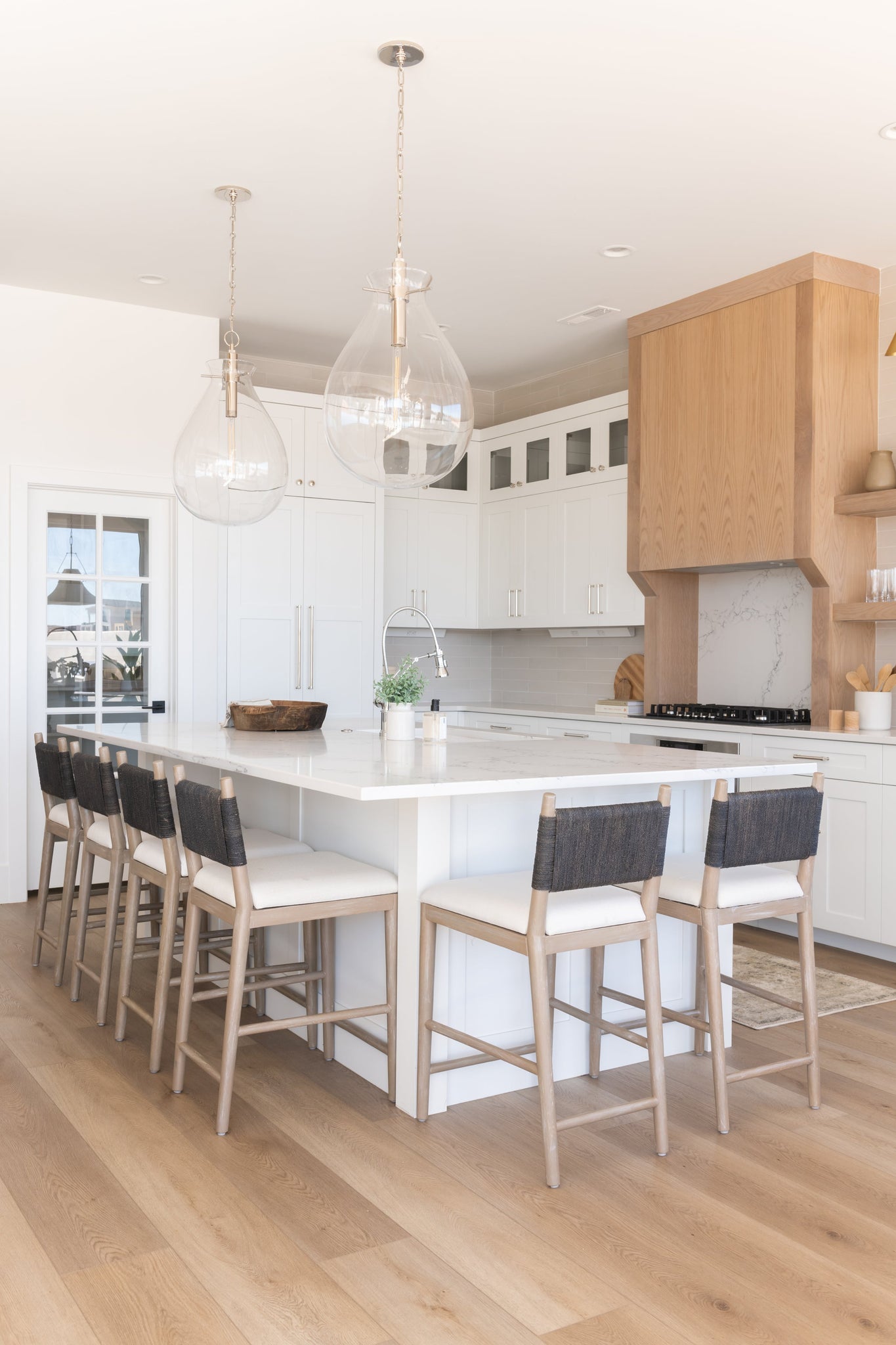 Ivy Pendant 18" in polished nickel styled in a bright kitchen for warm, layered light at Laurie Yapp Home.