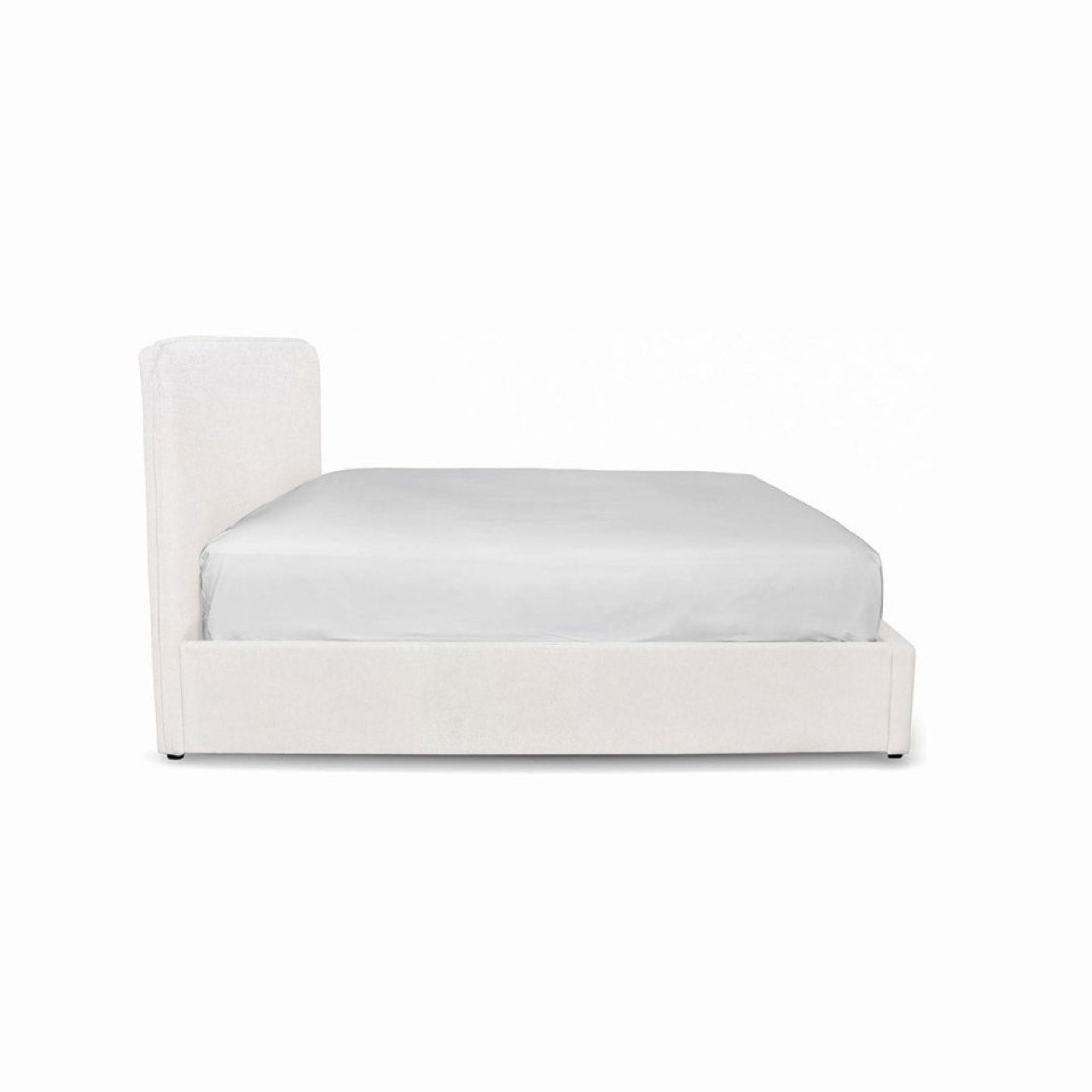 White upholstered bed with a mattress on a white background