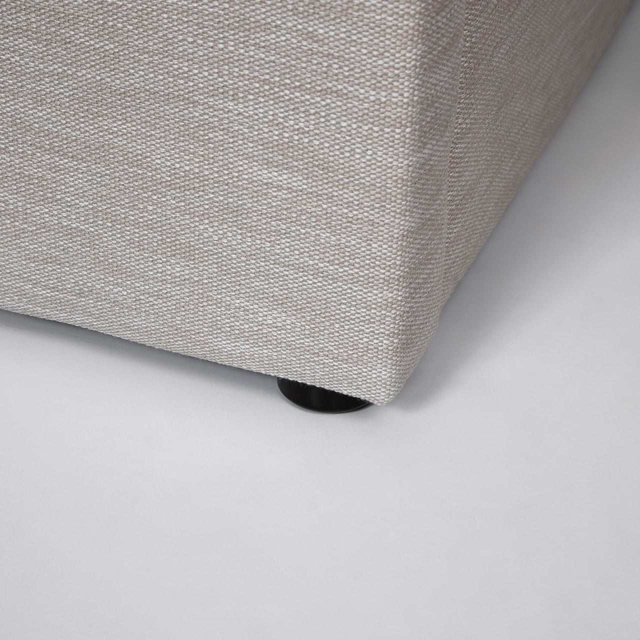 Close-up of a textured gray fabric surface