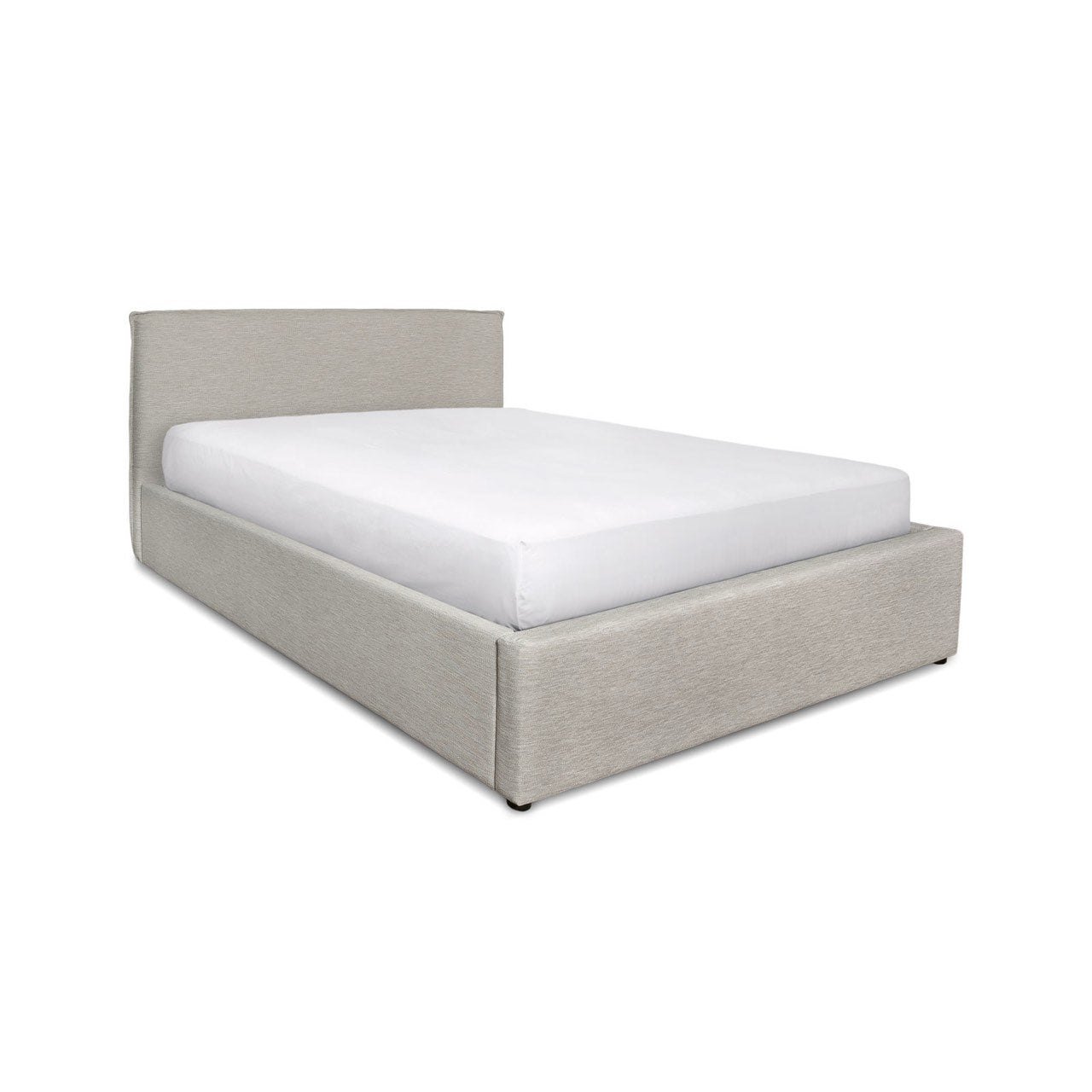 Beige upholstered bed frame with white mattress on a white background