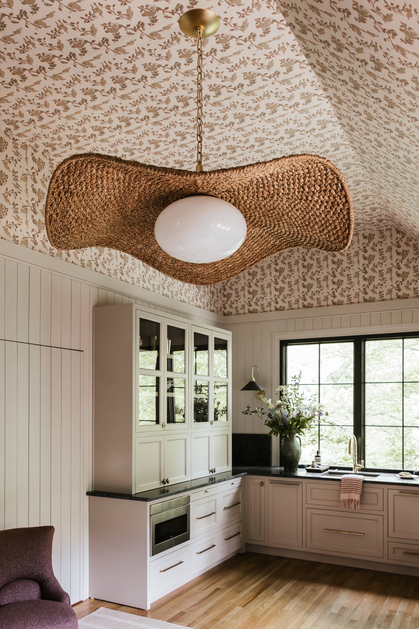 Levene Chandelier 58.75" styled in an elegant dining room for warm, layered light at Laurie Yapp Home.