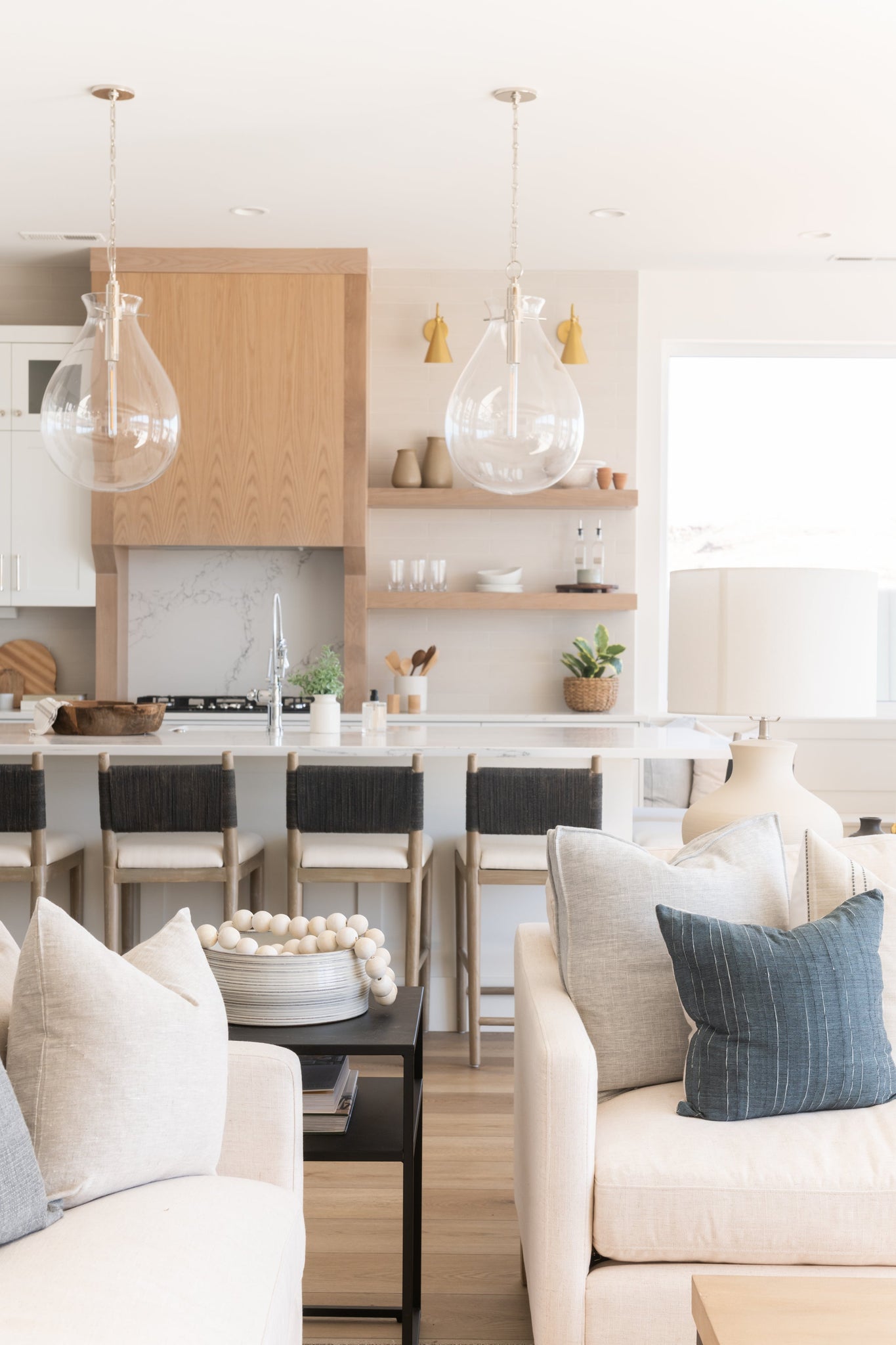 Ivy Pendant 18" in polished nickel styled in a welcoming entryway for warm, layered light at Laurie Yapp Home.