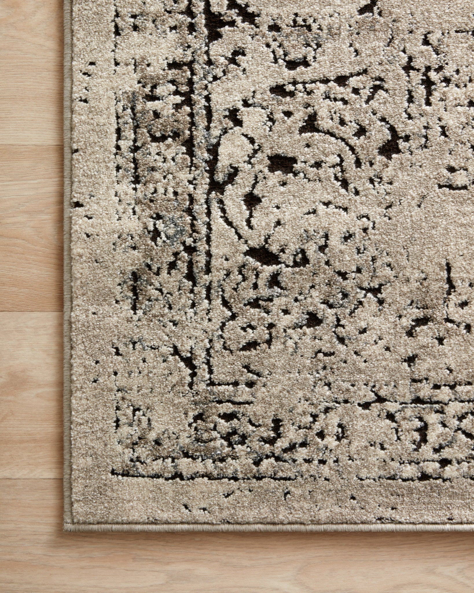 detail view of Millennium Stone / Charcoal luxury Rug