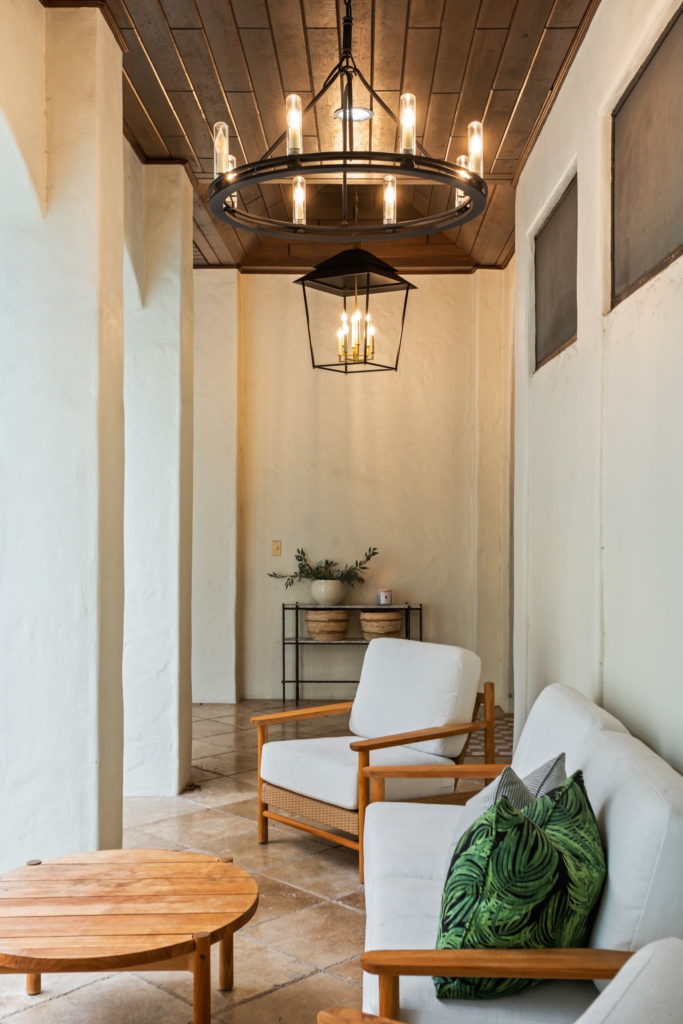 Sutton Exterior Chandelier styled in a two-story entry for warm, layered light at Laurie Yapp Home.