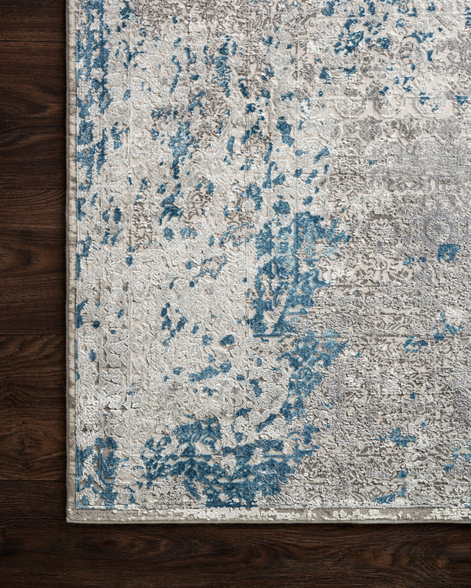 side view of Sienne Dove / Ocean luxury Rug