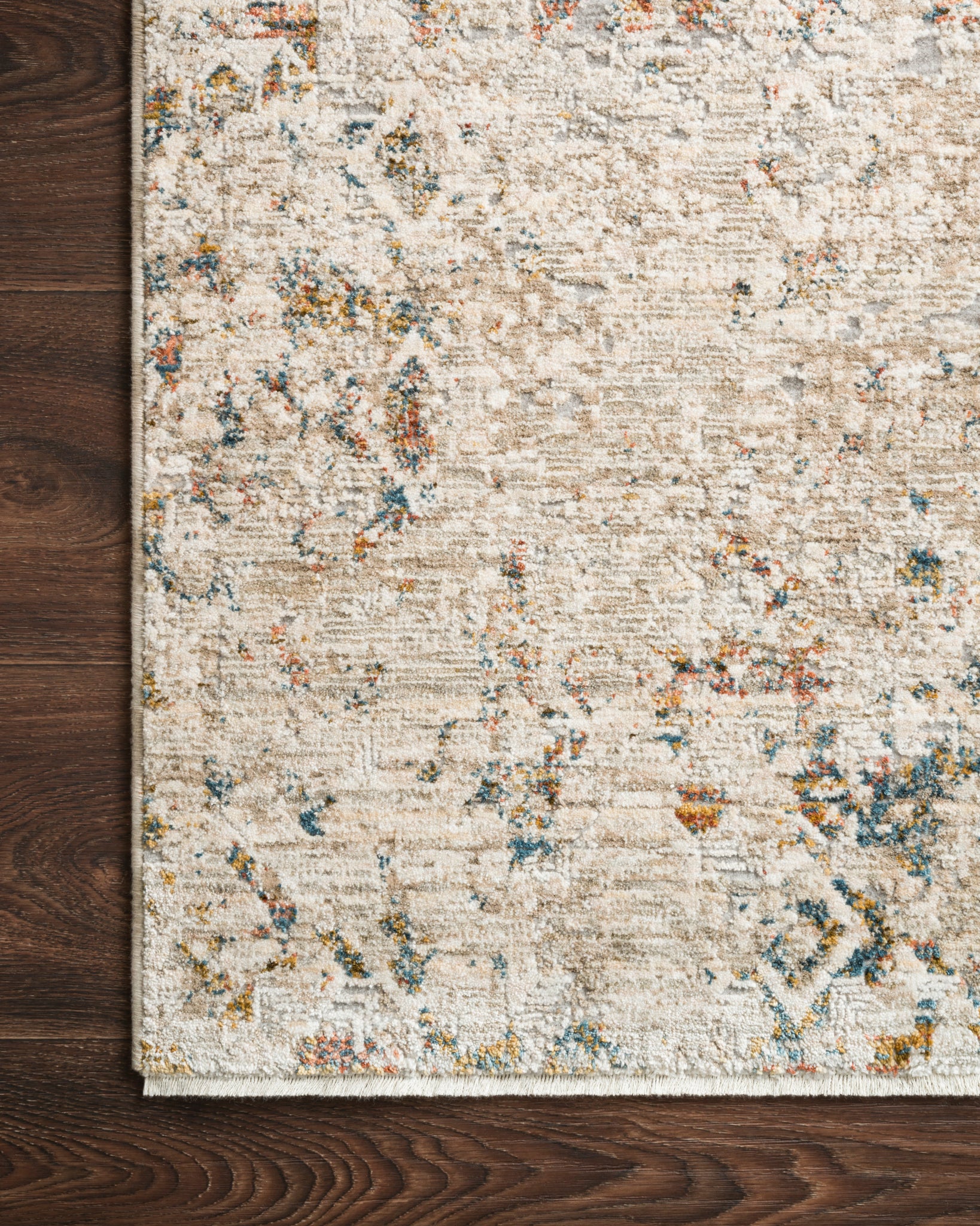side view of Theia Multi / Natural luxury Rug