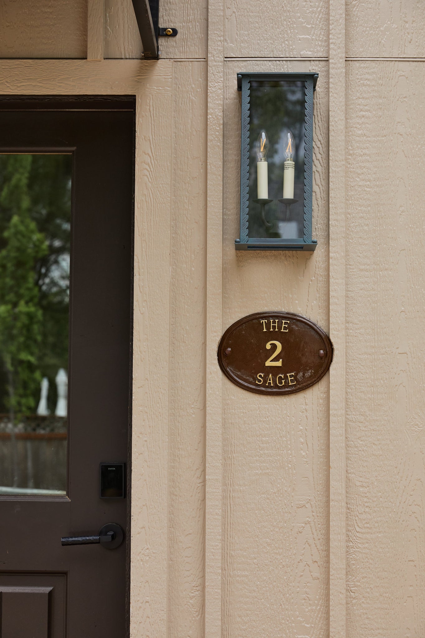 Zuma Exterior Wall Sconce 7.75" styled in a curated living room for warm, layered light at Laurie Yapp Home.