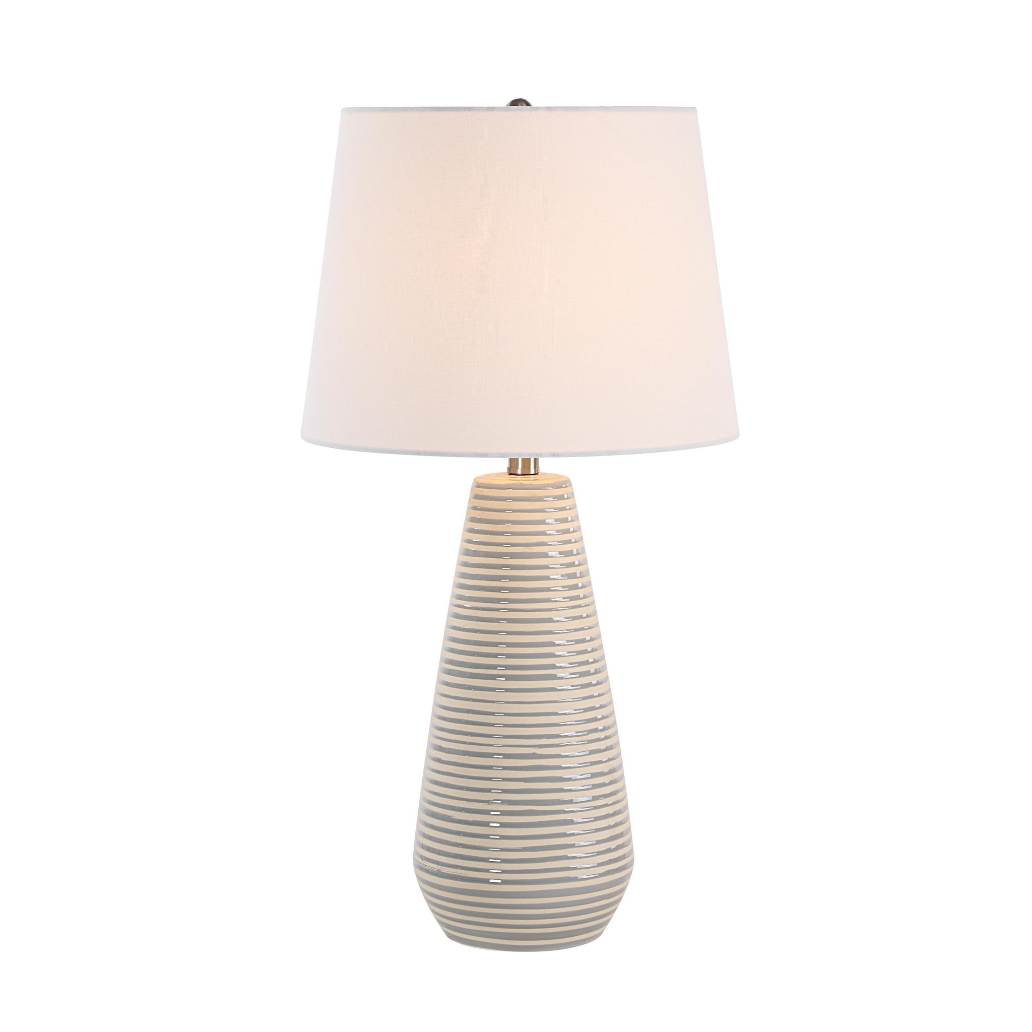 Pera Table Lamp featuring a white shade and a light beige striped ceramic base