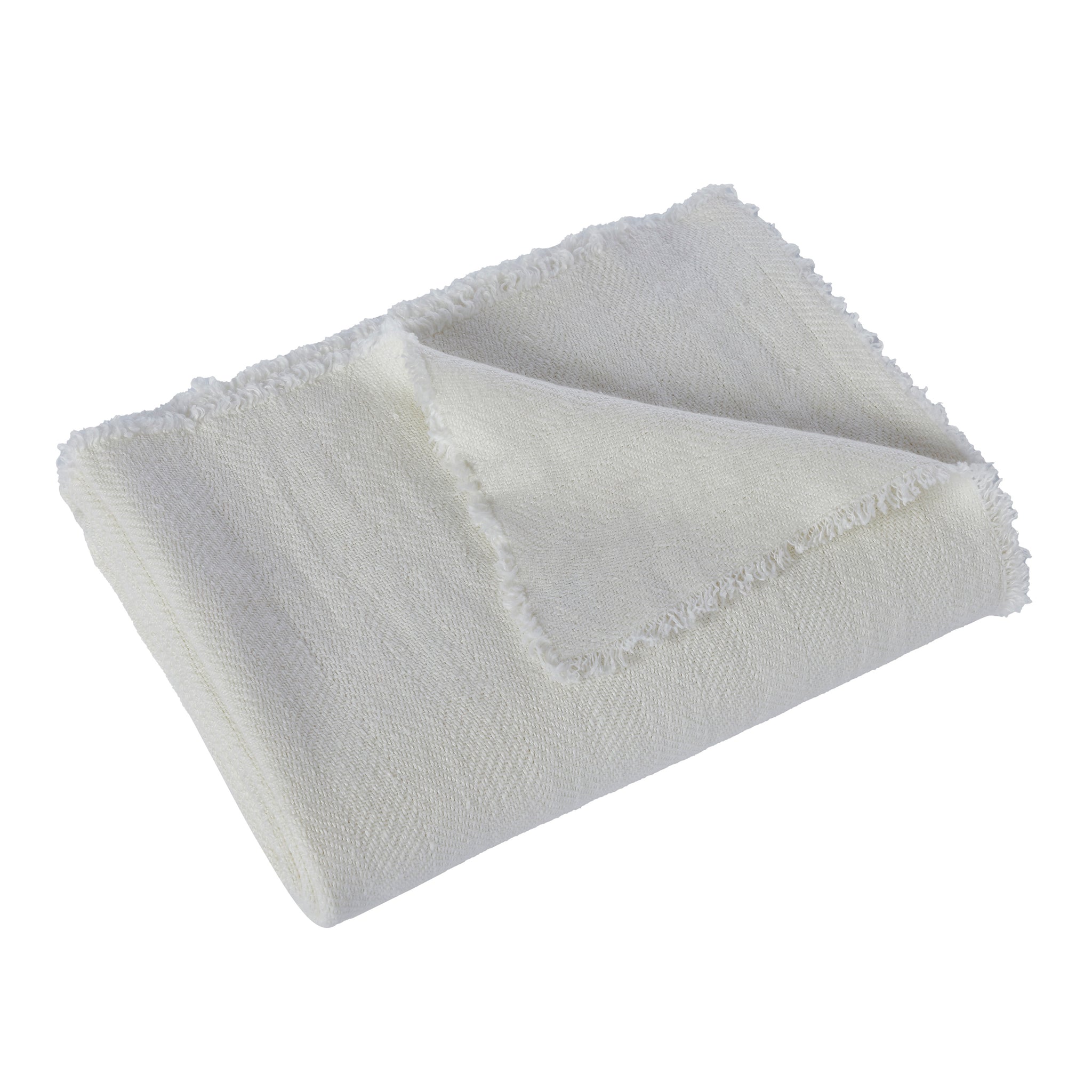 Ragusa Throw in soft white, featuring a textured weave and fringed edges, folded neatly.
