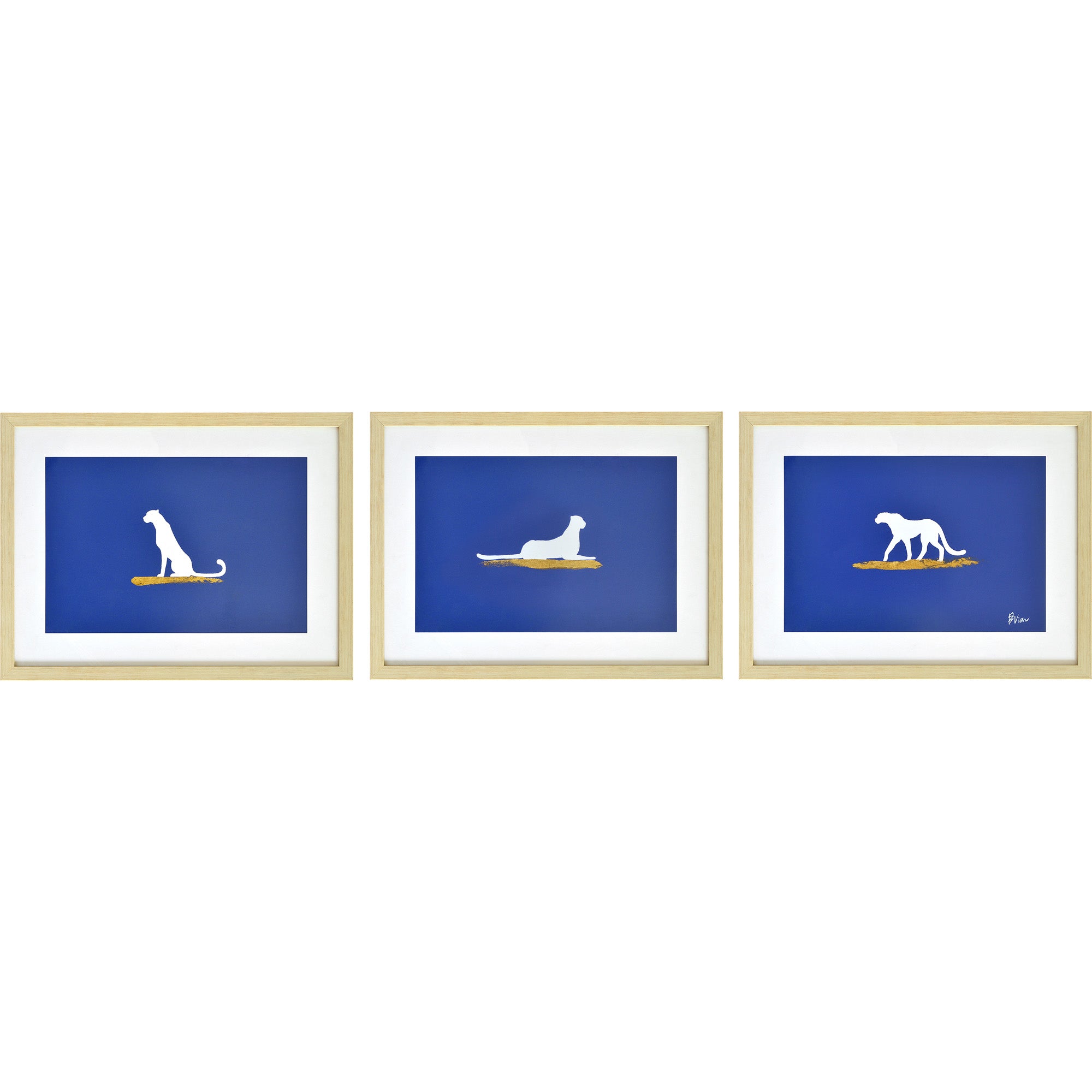 Makalu Wall Art featuring three framed silhouettes of dogs on a blue background