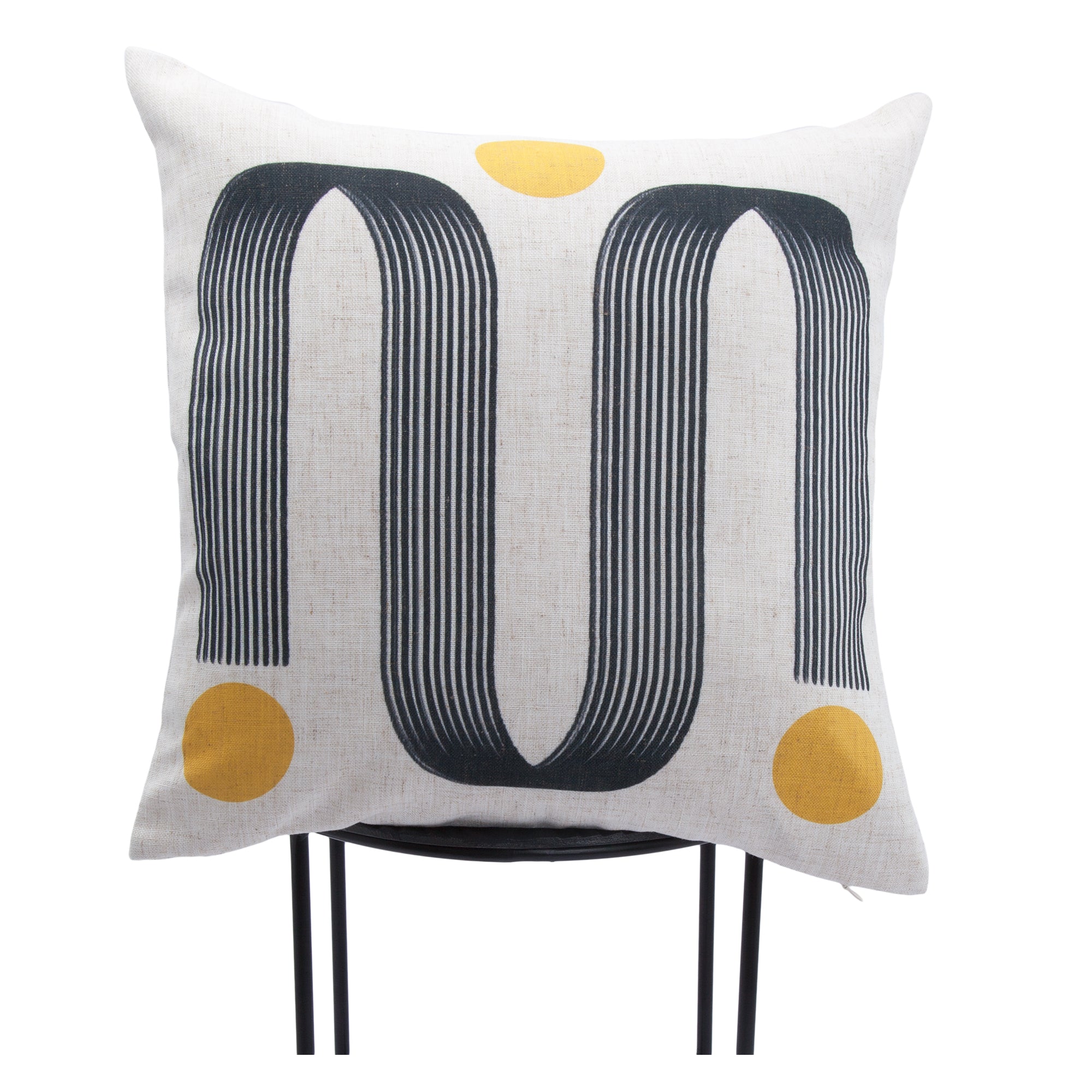 Turin Indoor Pillow with a black striped design and yellow circles, displayed on a chair.