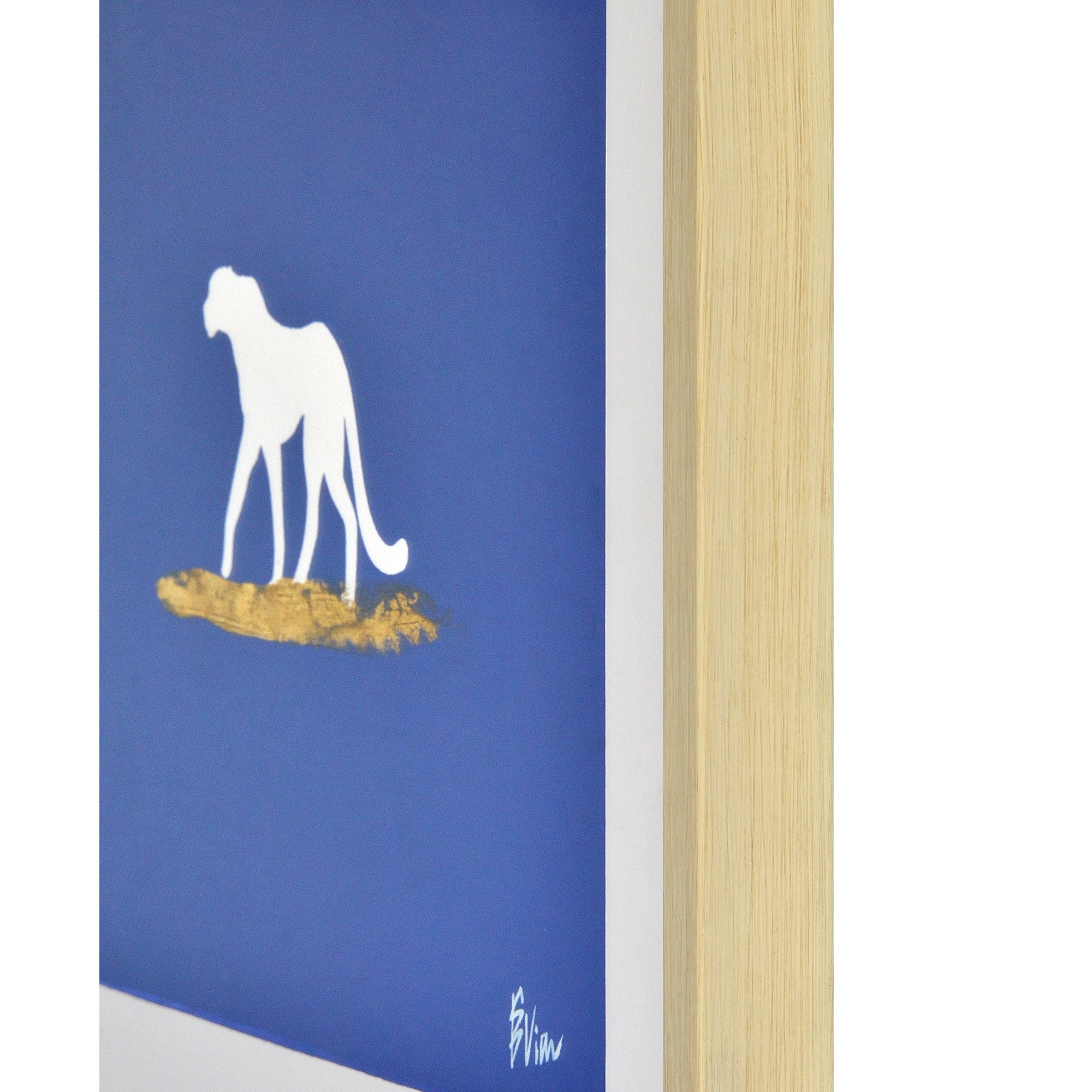 Makalu Wall Art side view of a white dog silhouette on a blue background with a gold accent