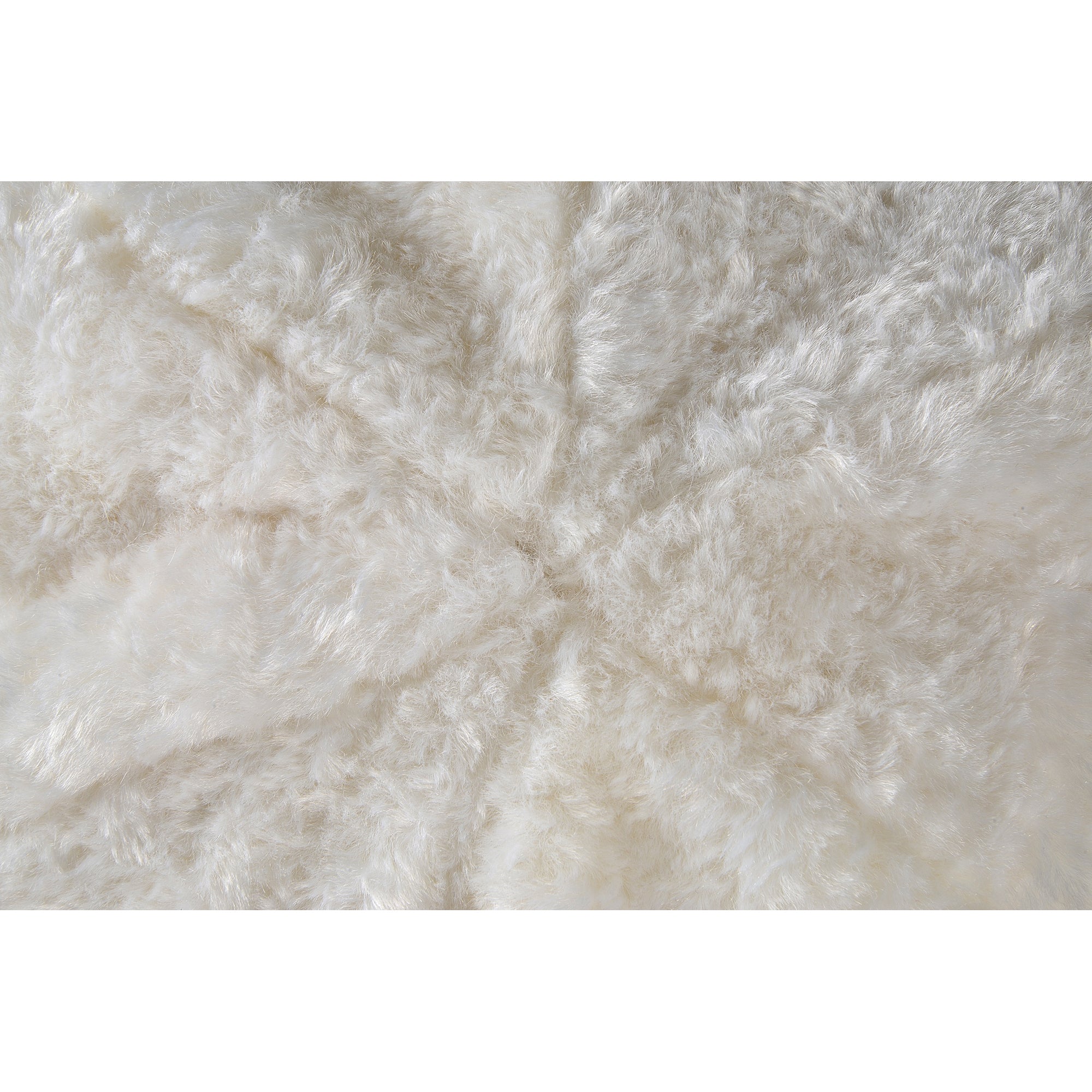 Top view of Freddie Indoor Pillow, highlighting the soft cream texture and seam details.