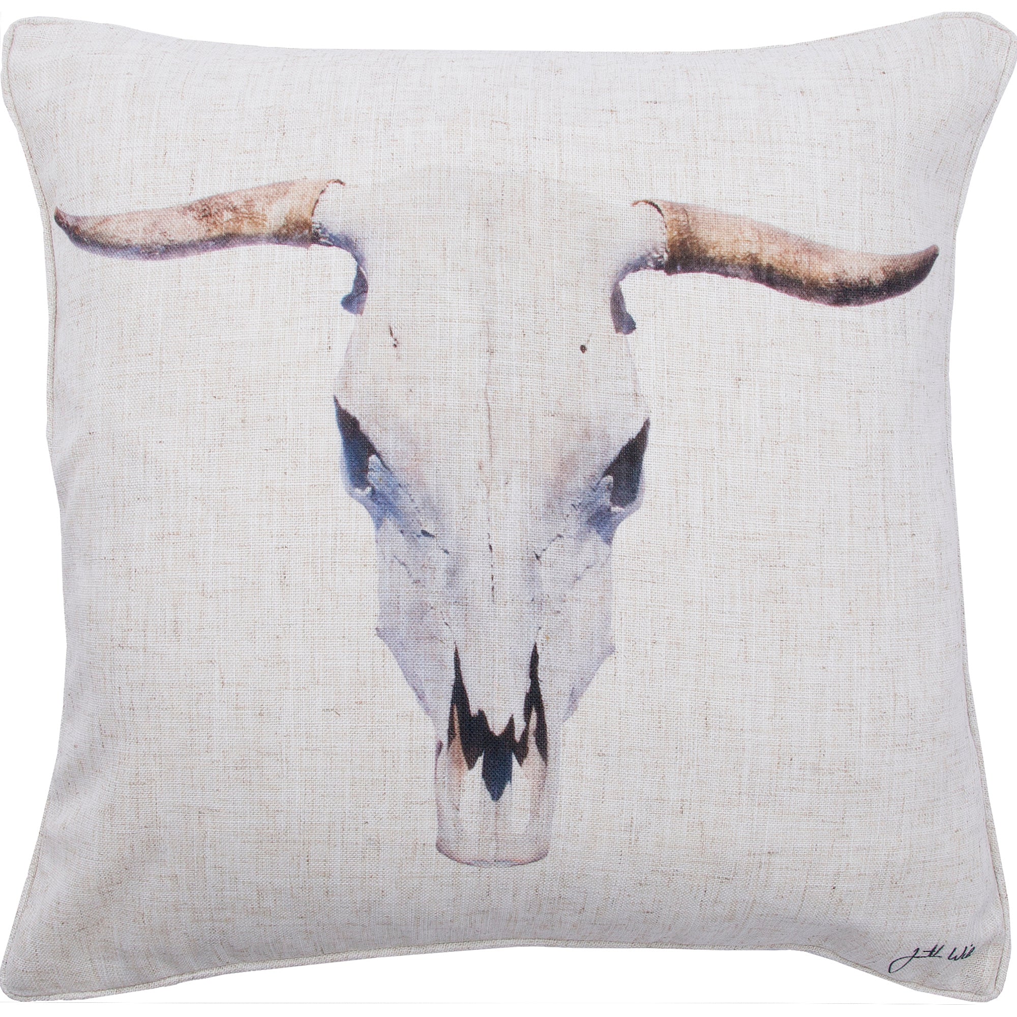 Elgin pillow featuring a bull skull design on a beige linen background.