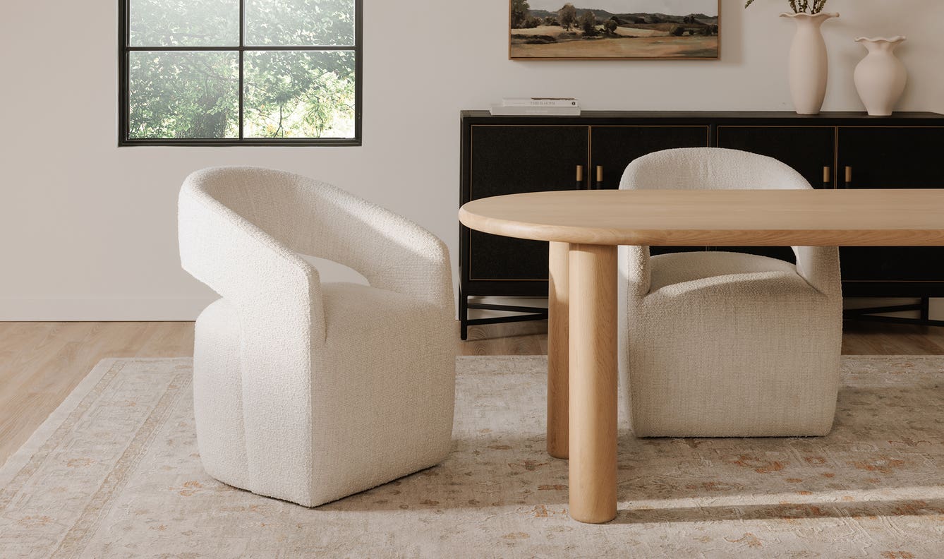 lifestyle view of Barrow Rolling Dining Chair White Mist luxury Chair