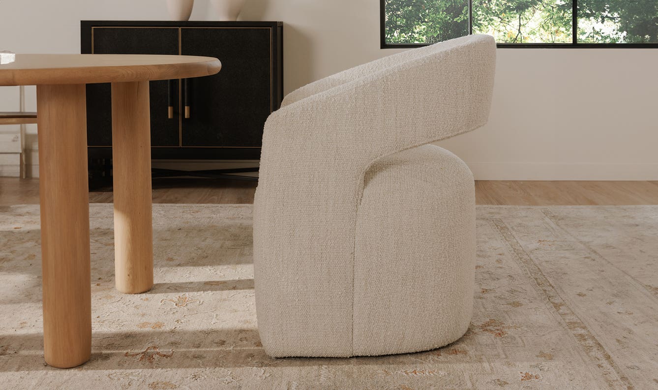 lifestyle view of Barrow Rolling Dining Chair White Mist luxury Chair