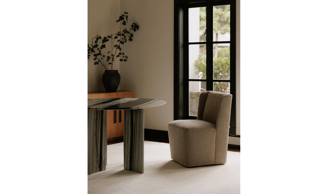 angle view of Cormac Rolling Dining Chair Performance Fabric Warm Sand luxury Chair
