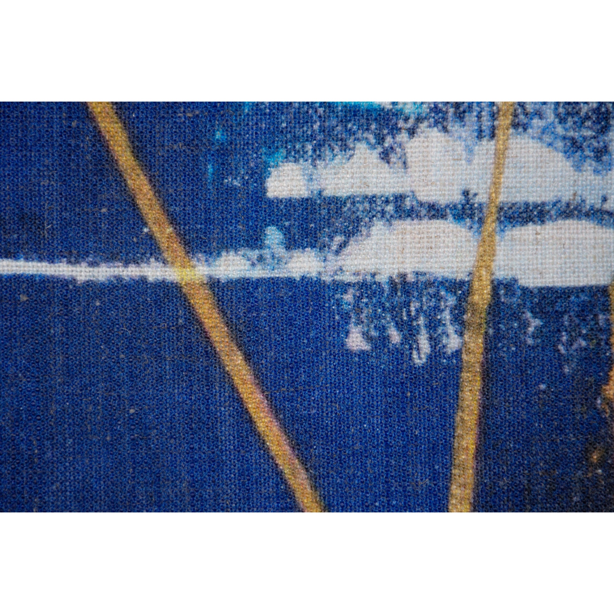 Close-up of Kasson Indoor Pillow showcasing blue fabric with abstract patterns