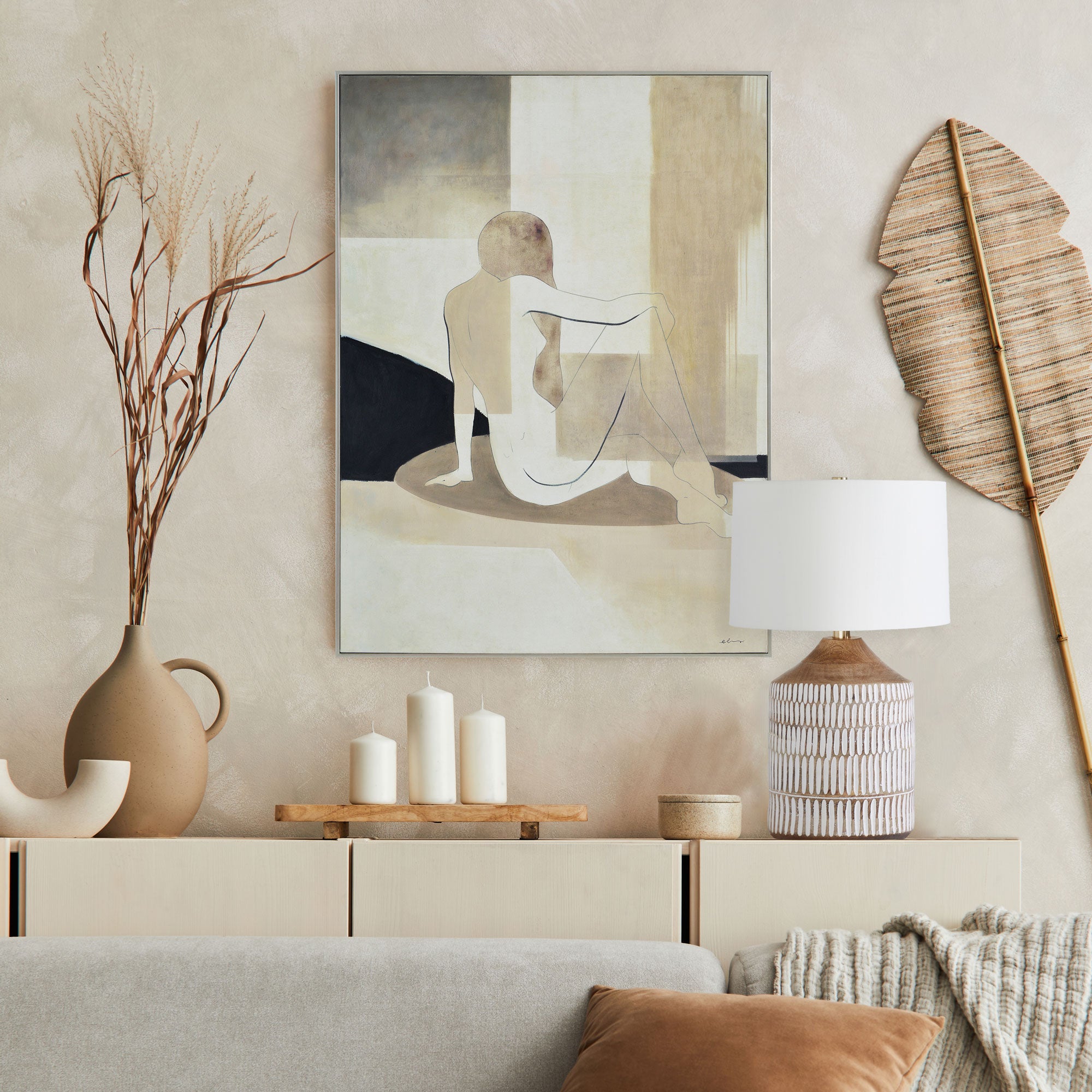 Avella canvas art displayed in a stylish living room with decorative elements.