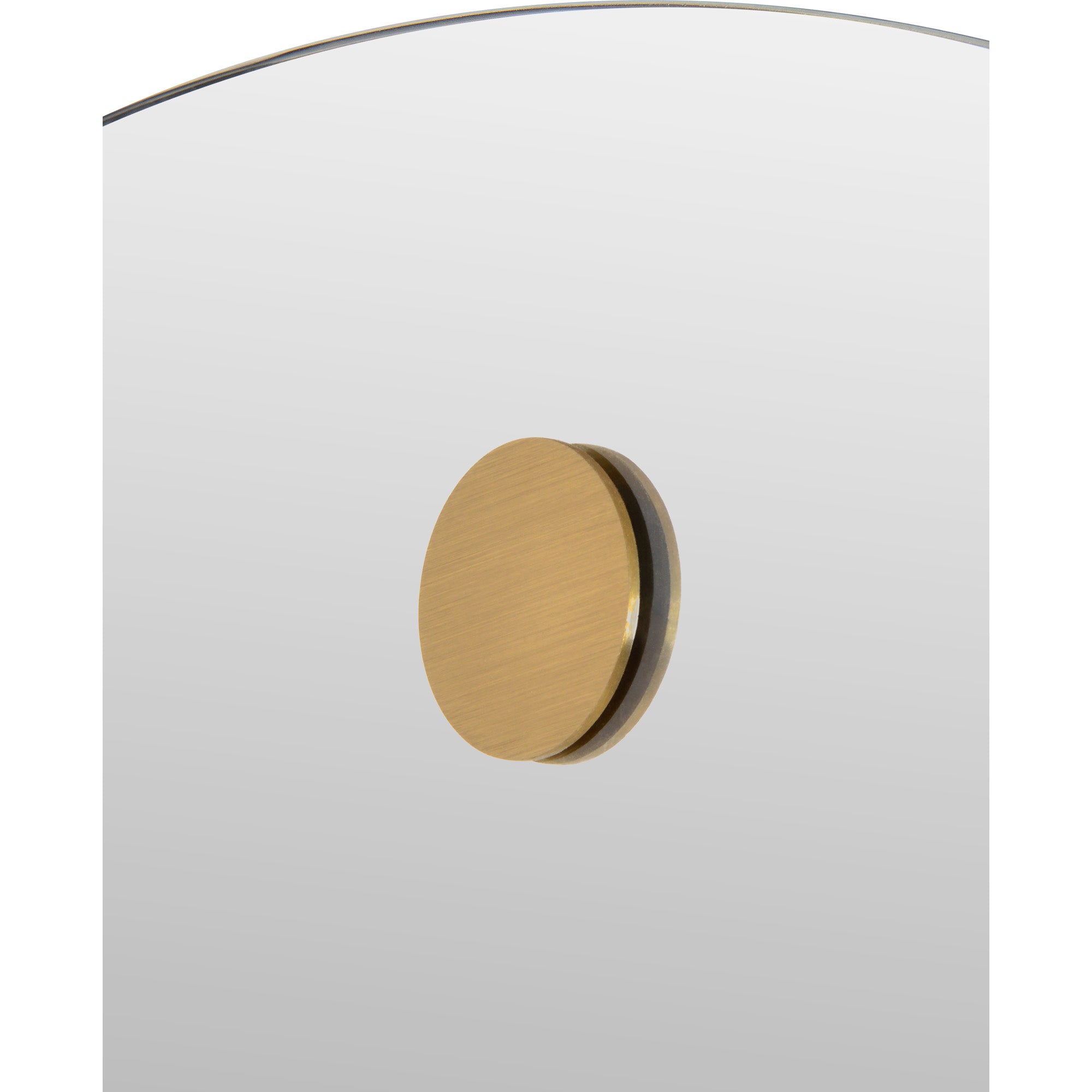 Zachary Wall Mirror close-up showing a brass circular accent on the surface.
