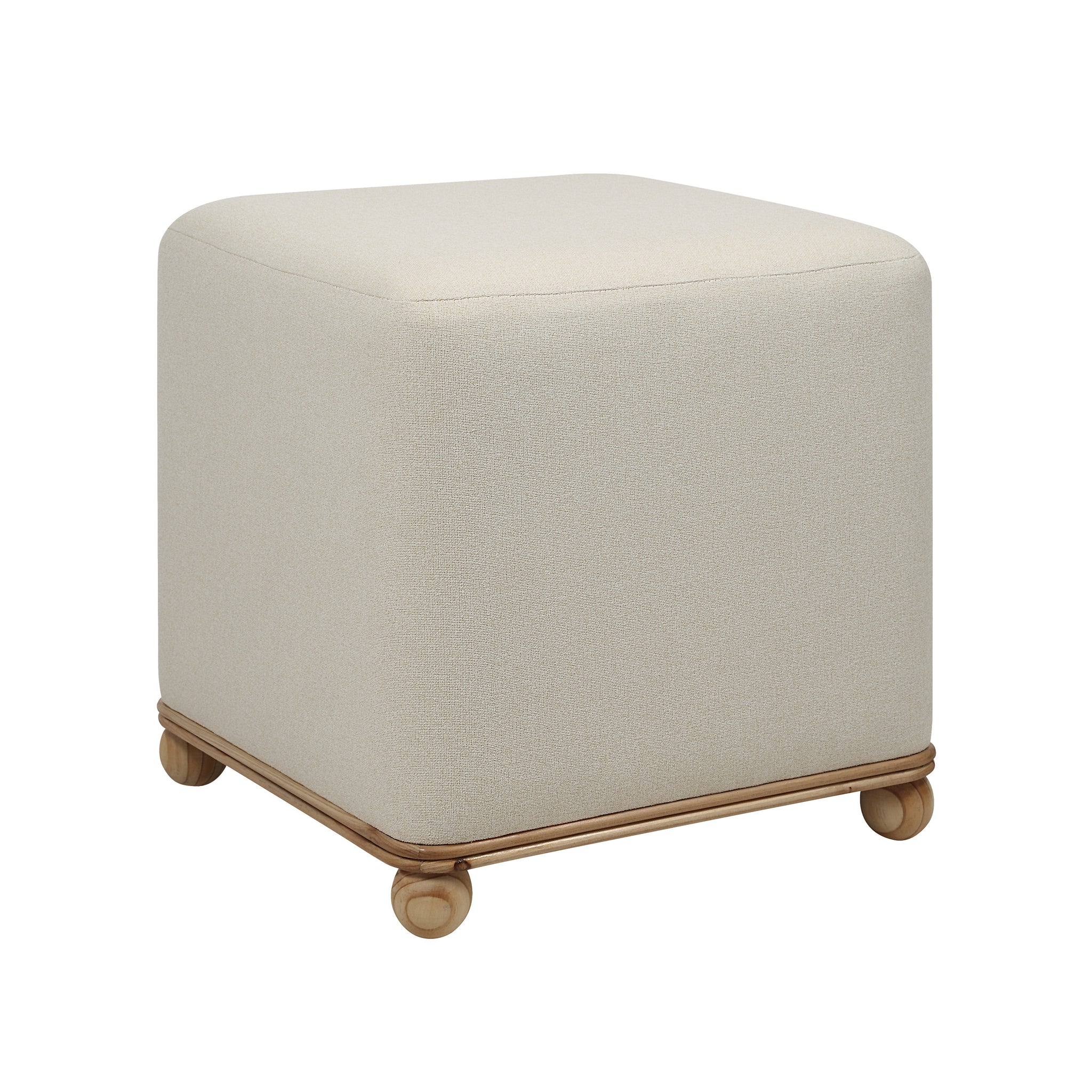 Sines Ottoman featuring light beige upholstery and wooden legs, angled view