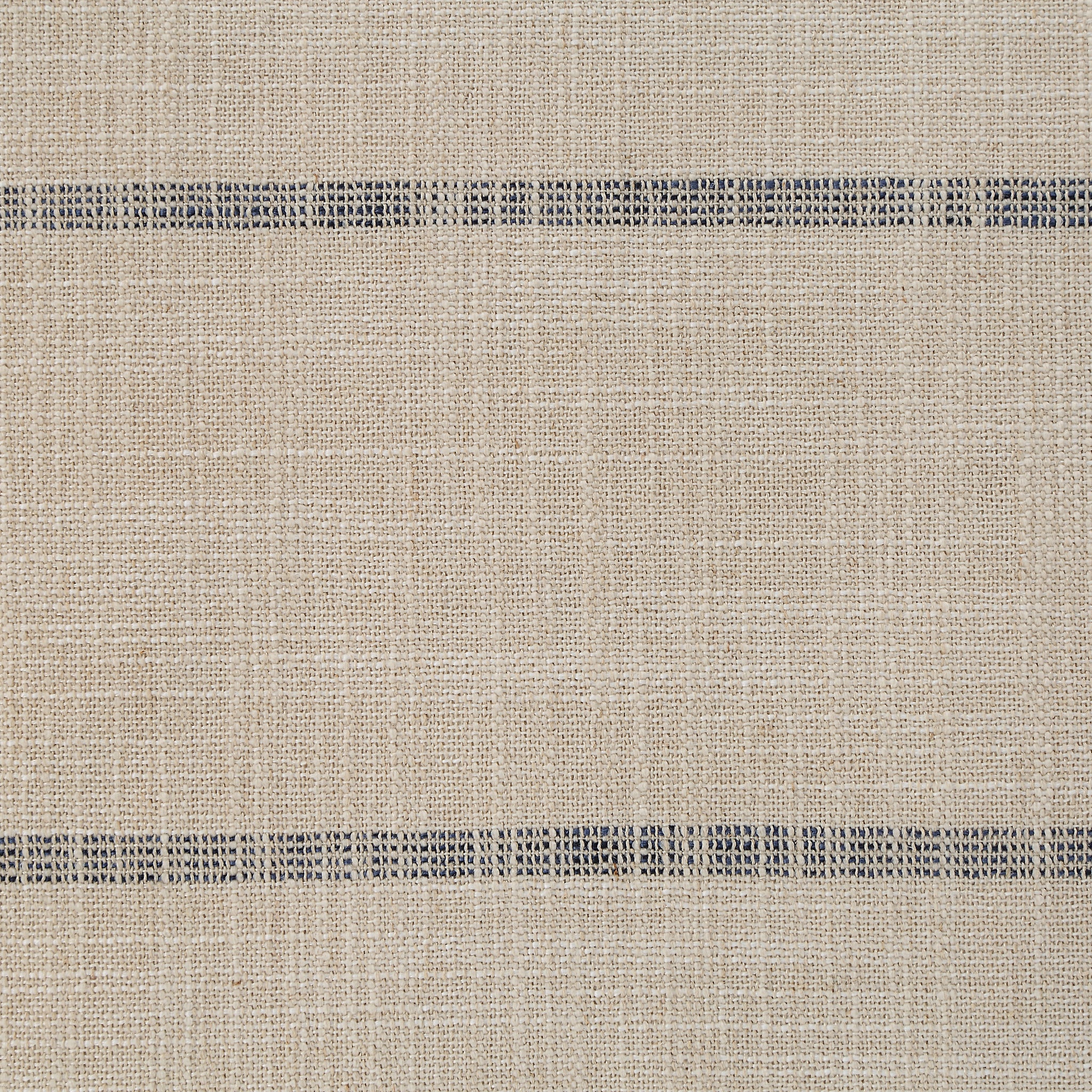 Close-up of Montana indoor pillow fabric showing beige and black stripes