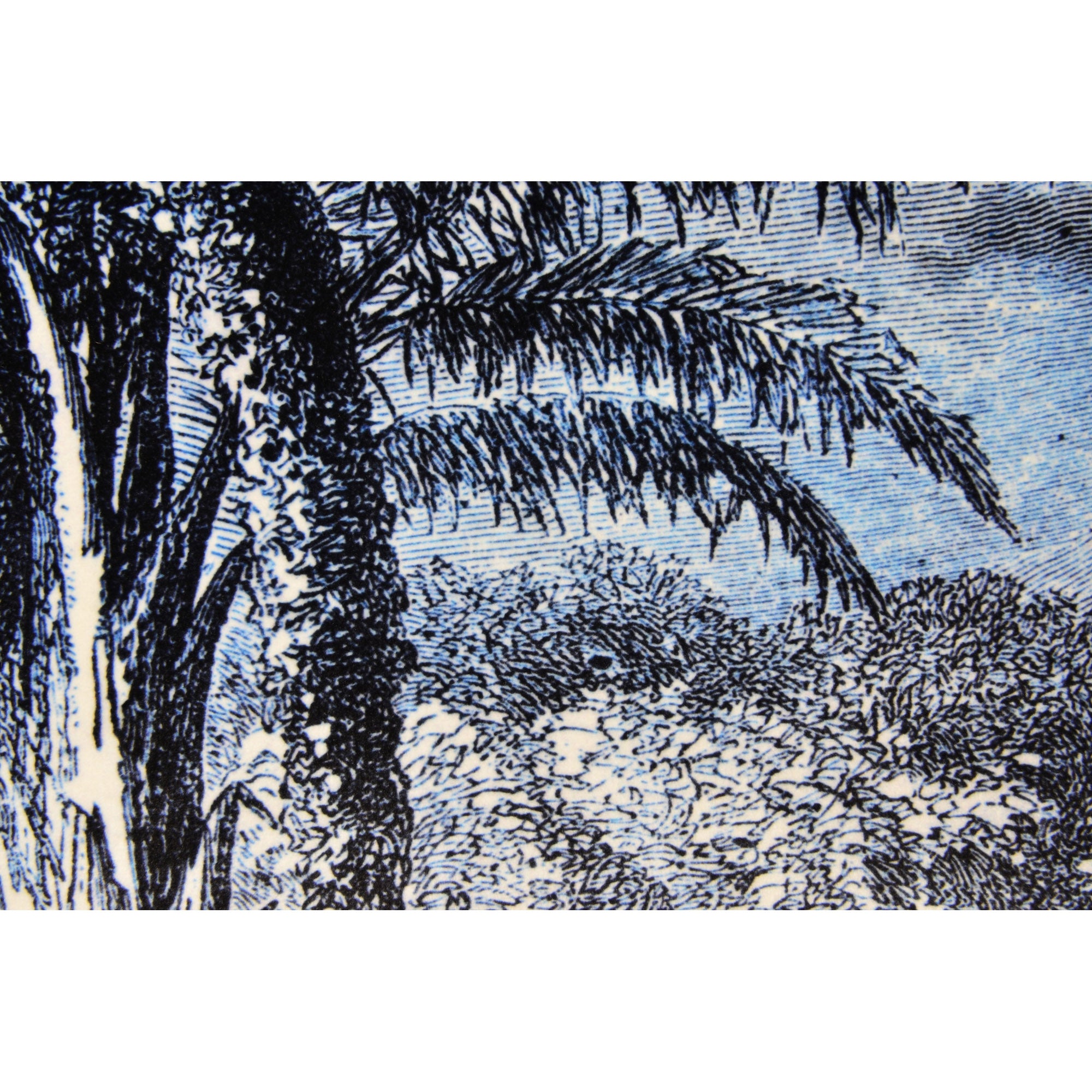 Close-up of Jona Indoor Pillow showcasing detailed blue palm tree artwork on fabric.