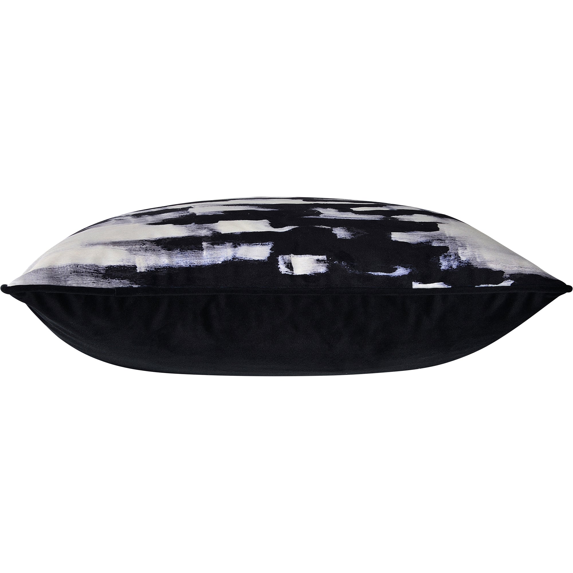 Side view of Markat Indoor Pillow displaying its plush black and white design.