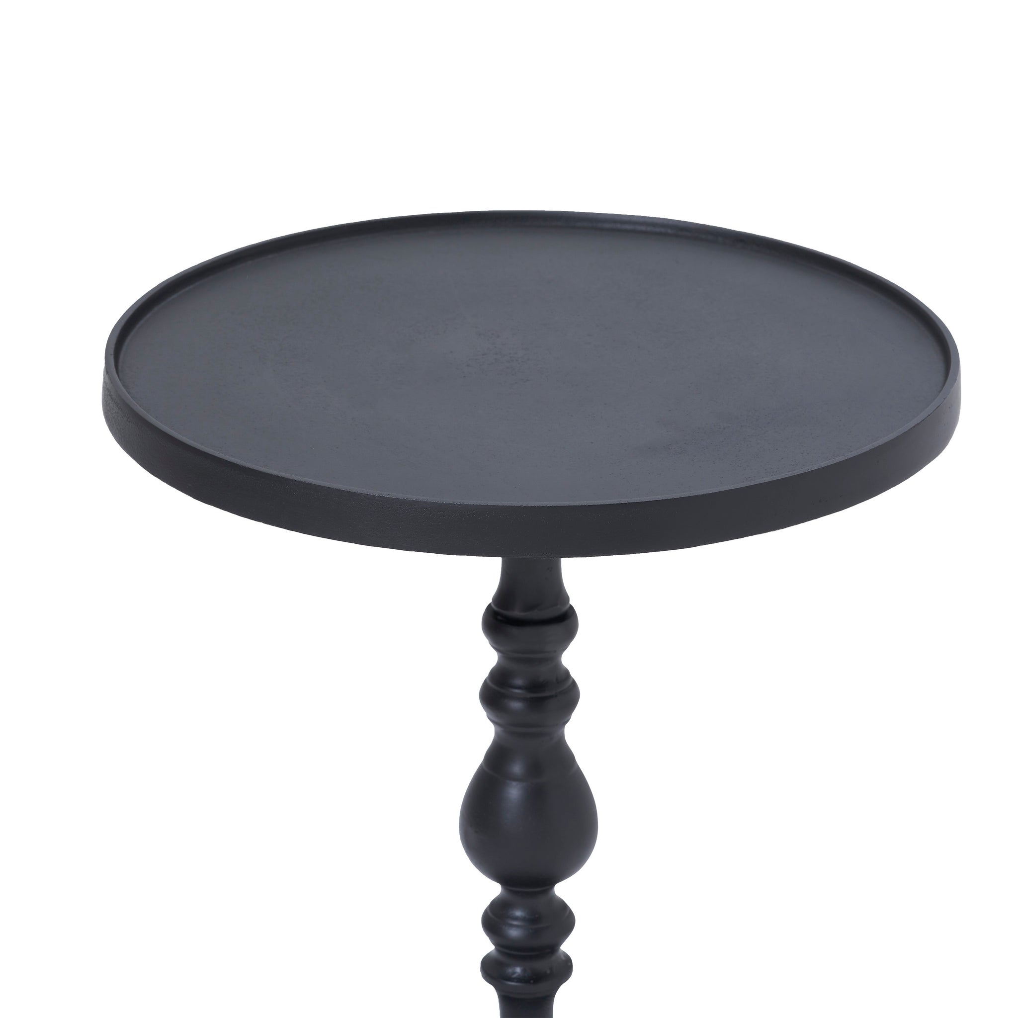 Close-up of Yates Side Table showing the round black top and elegant stem