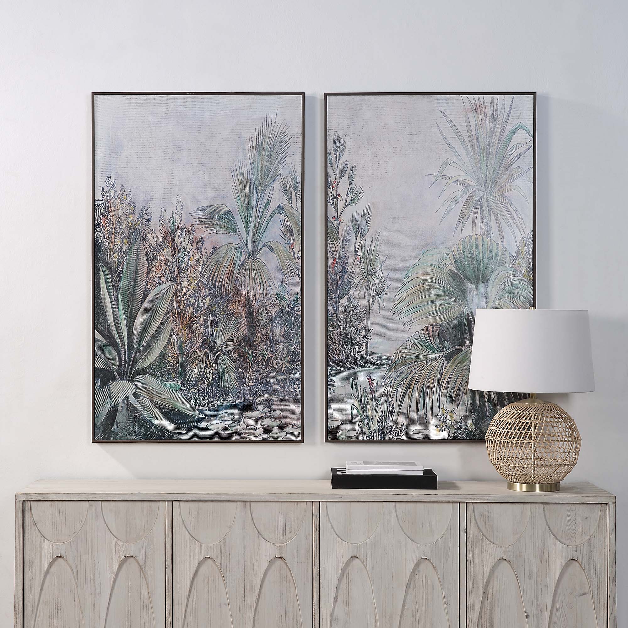 Labyrinth Canvas Art displayed above a wooden console with a lamp, featuring lush greenery.