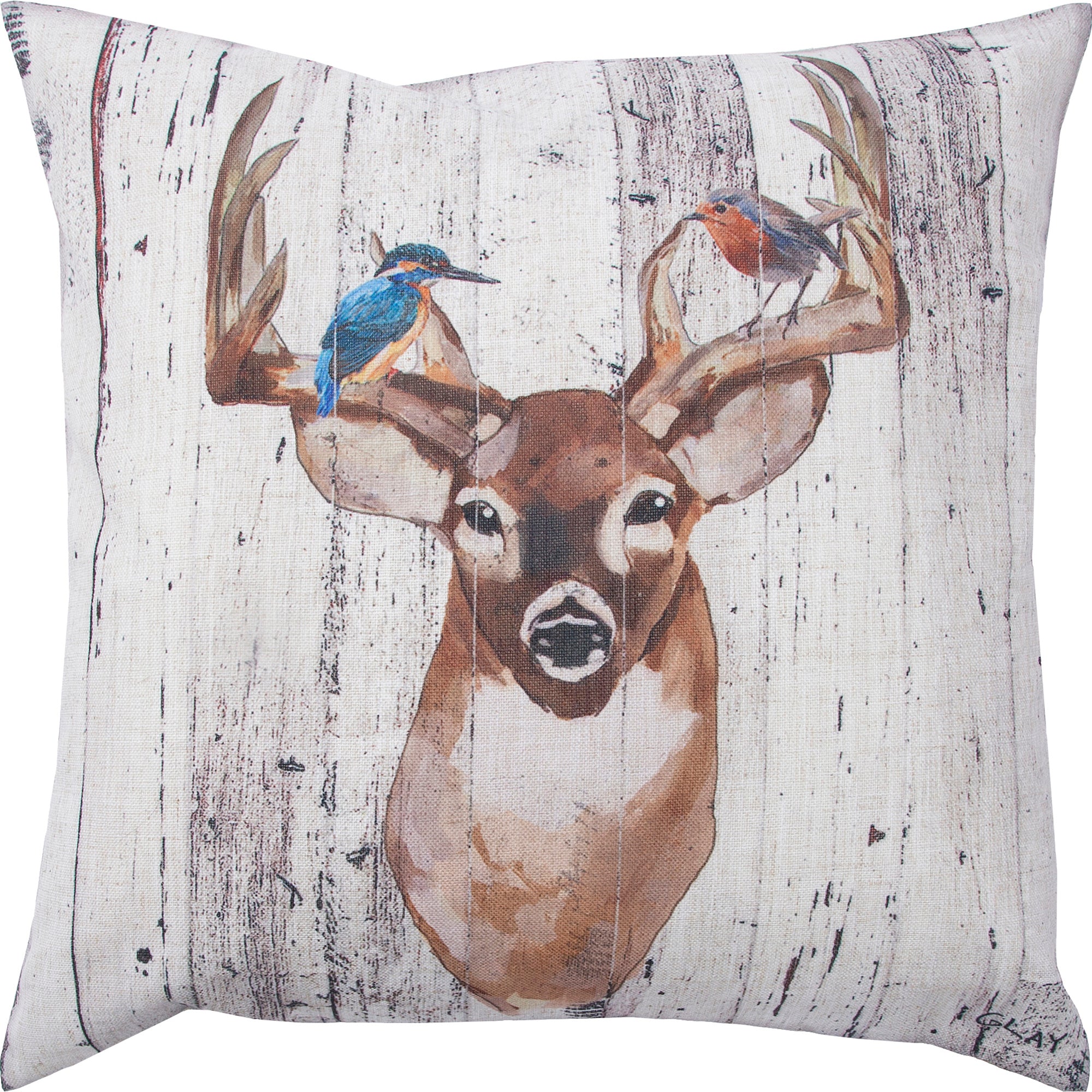 Montana indoor pillow featuring a deer with birds on antlers, rustic design on a light background.