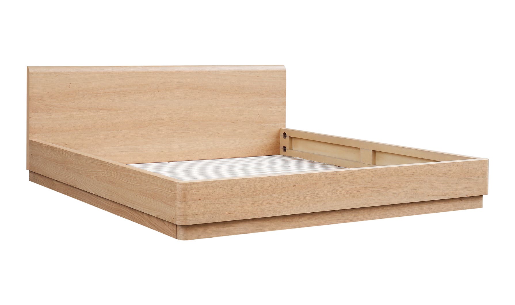 Wooden bed frame with mattress on a white background