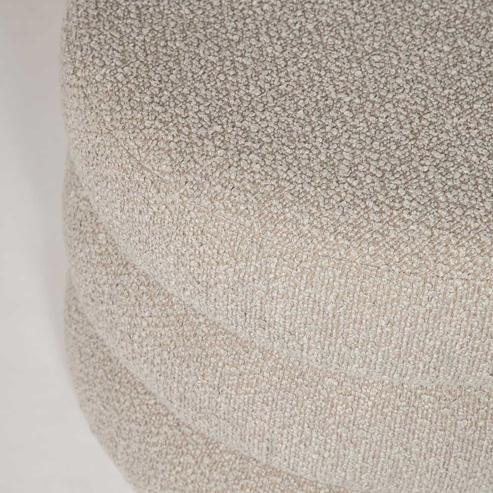 Beige textured ottoman on a white background