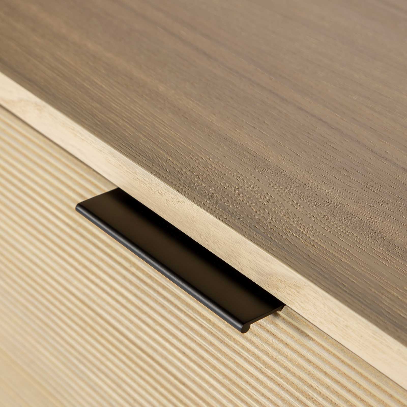 Wooden sideboard with three doors on a white background