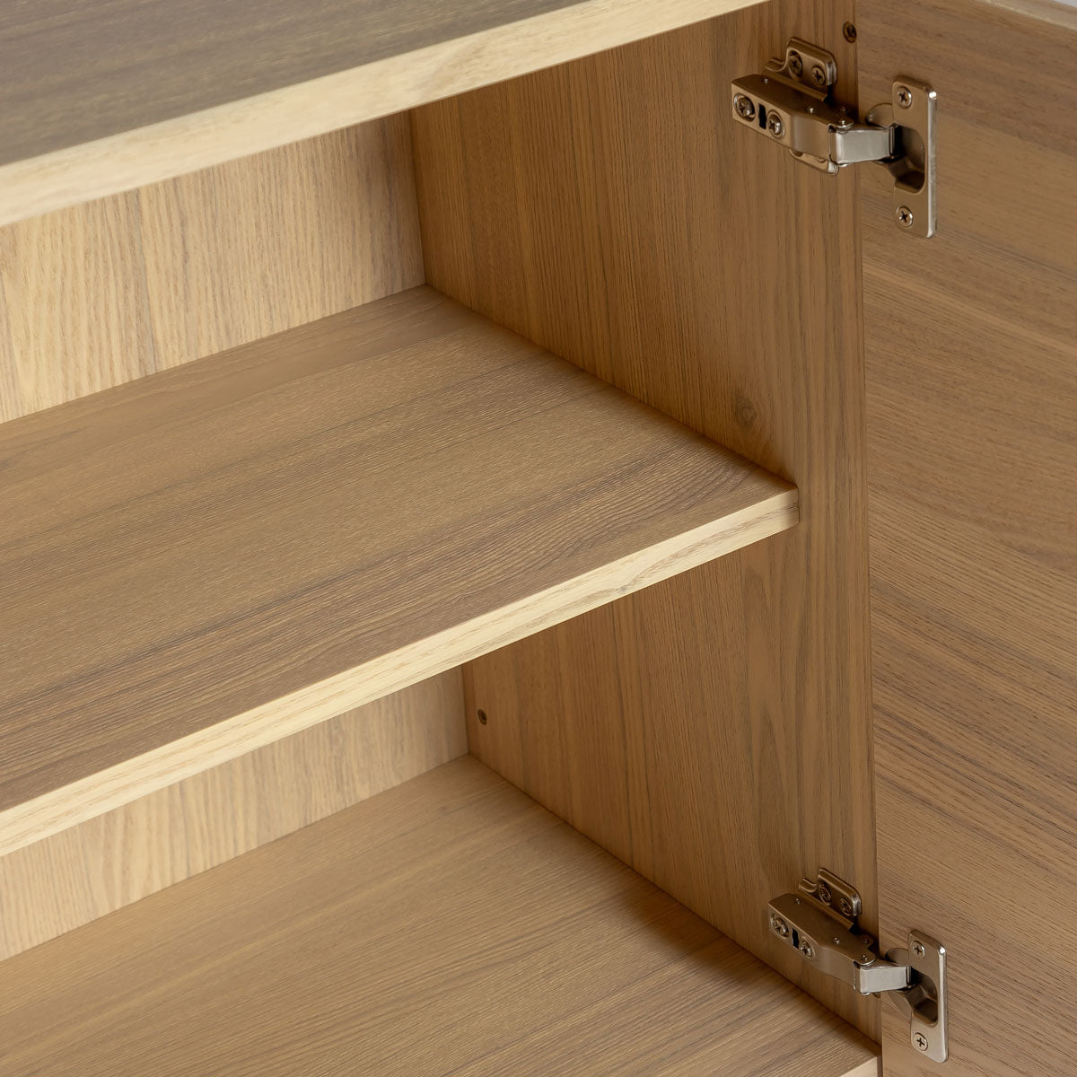 Wooden sideboard with two doors on a white background